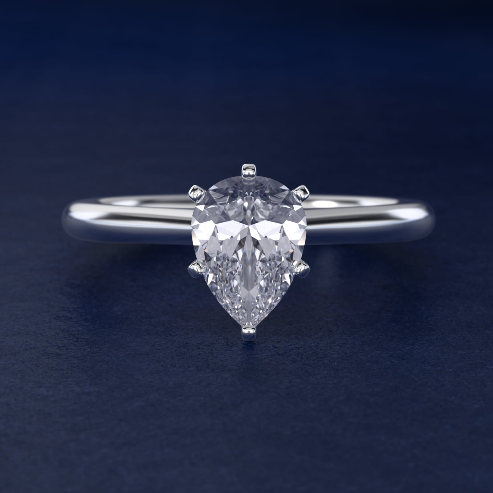 Petite Solitaire Engagement Ring in Platinum - Pear Center