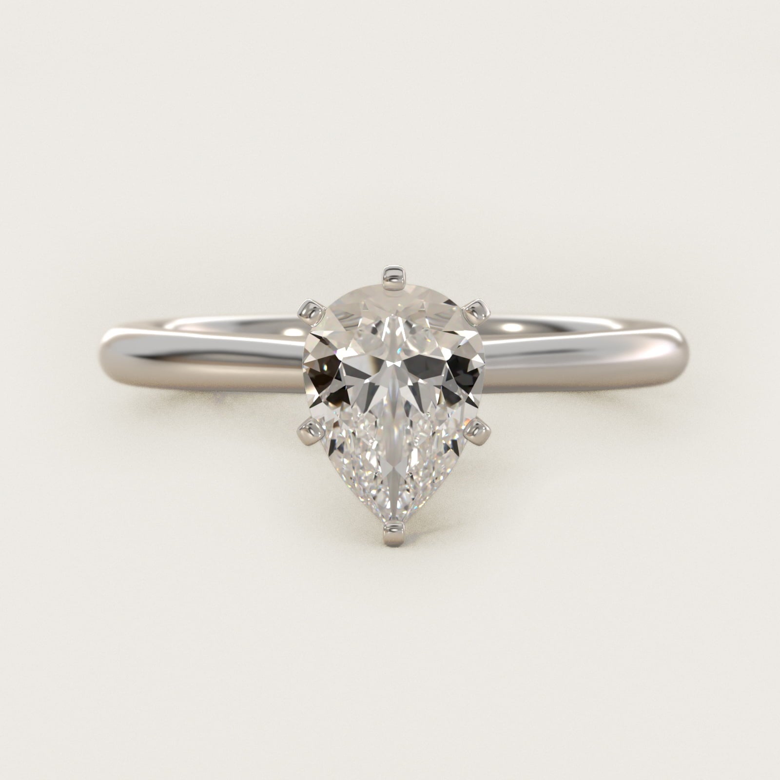 Petite Solitaire Engagement Ring in Platinum - Pear Center