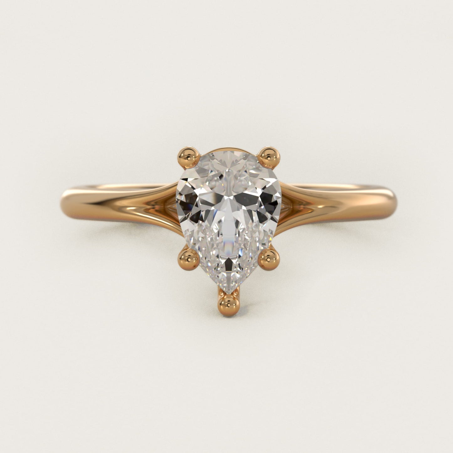 Petite Split Shank Solitaire in 14k Yellow Gold - Pear Center
