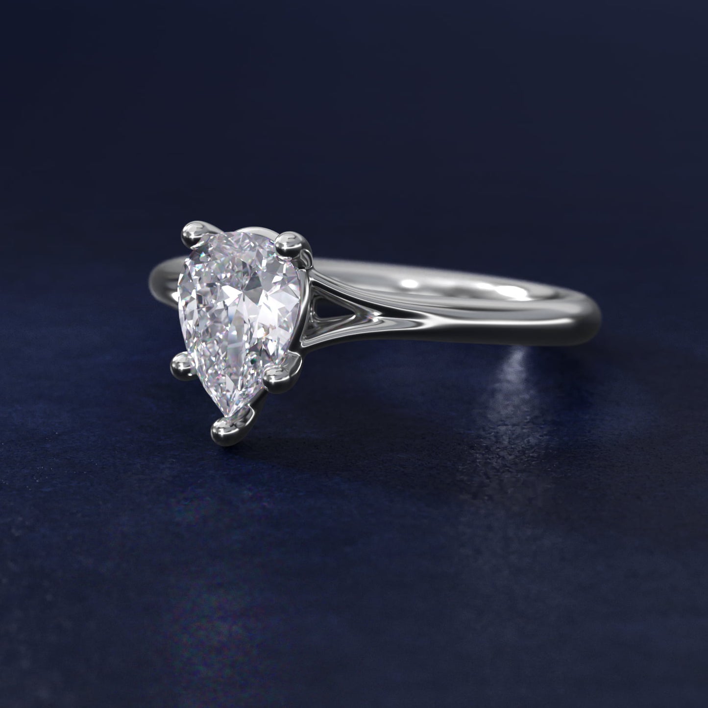Petite Split Shank Solitaire in Platinum - Pear Center
