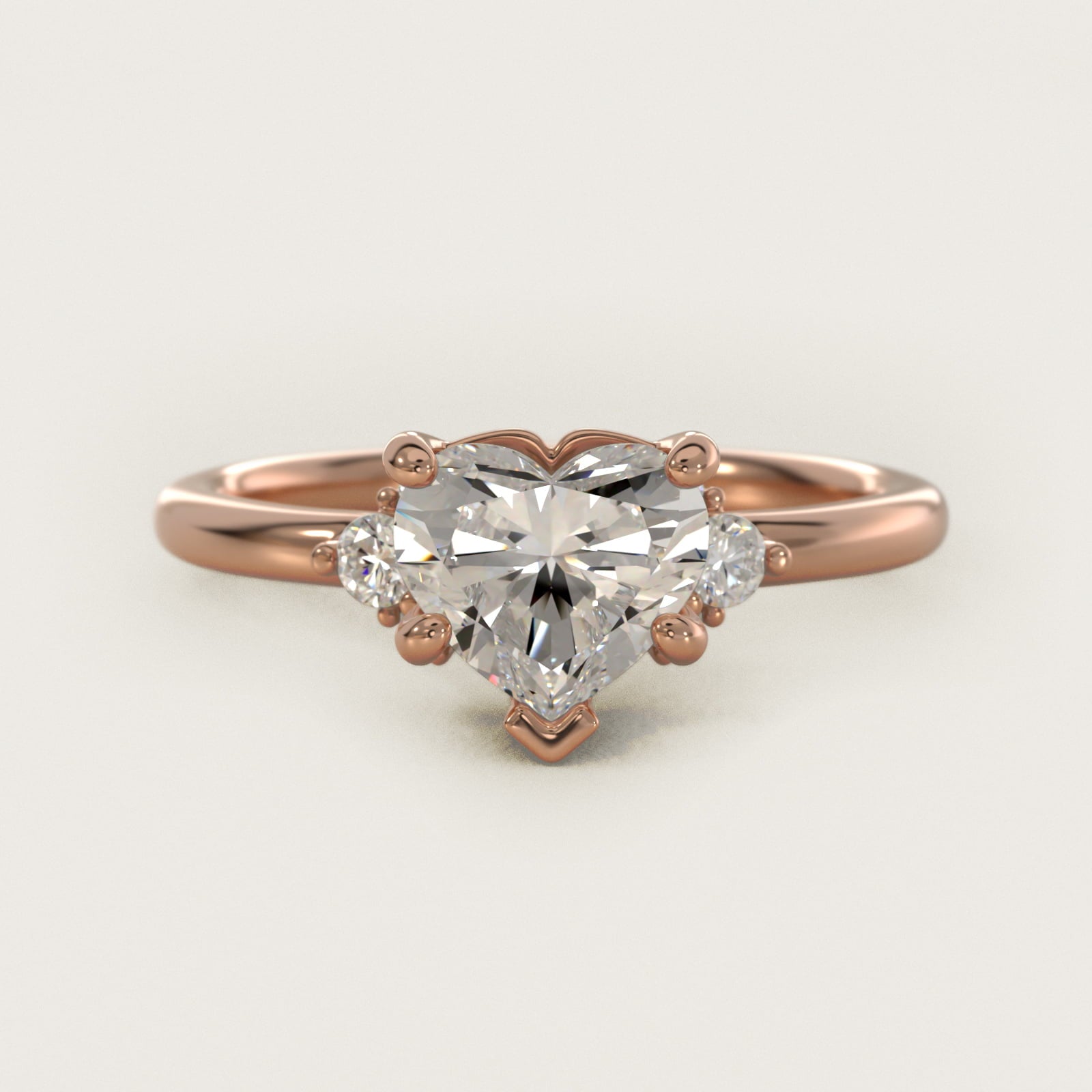 Petite Three Diamond Engagement Ring in 14k Rose Gold (1/10 ct. tw.) - Heart Center