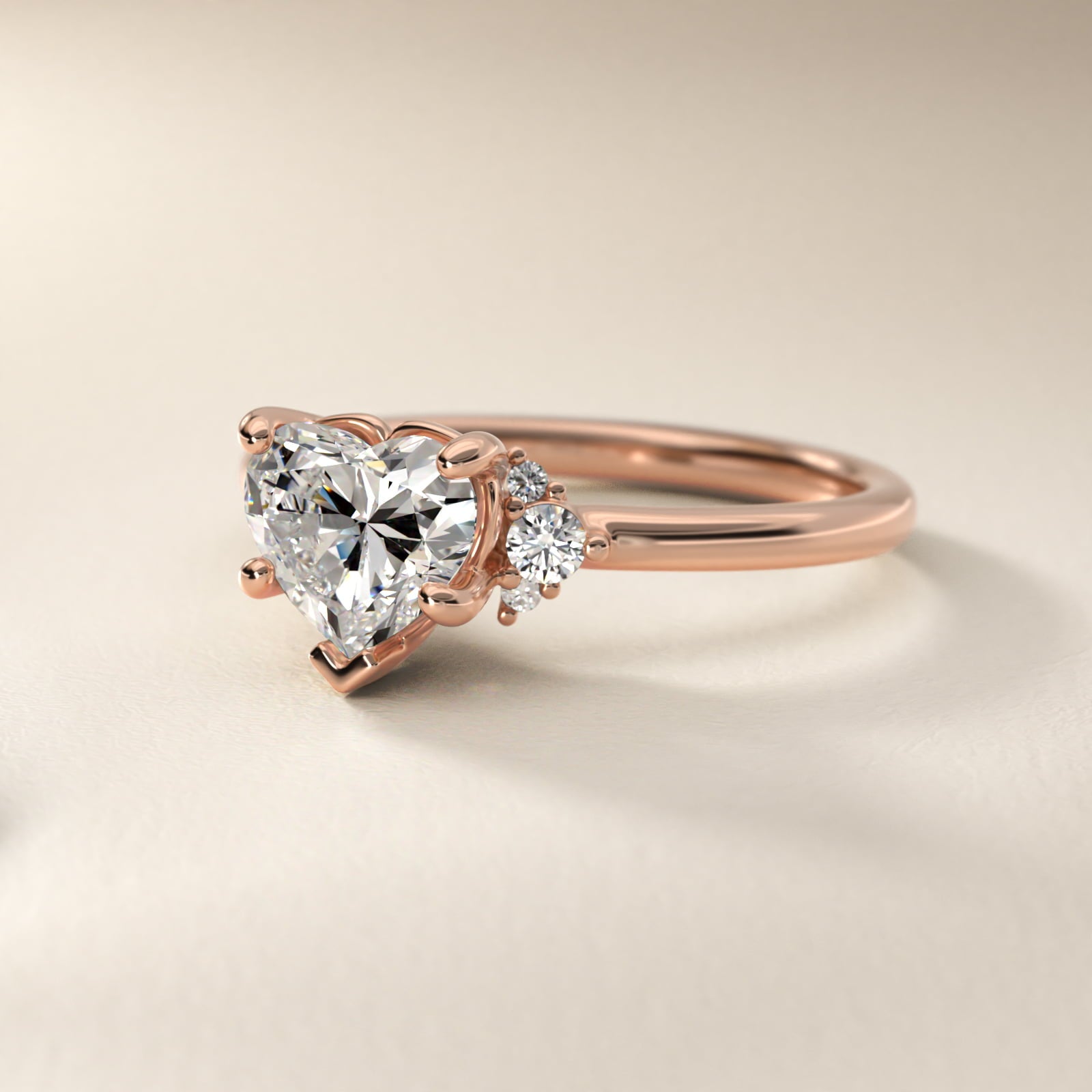 Petite Three Diamond Engagement Ring in 18k Rose Gold (1/10 ct. tw.) - Heart Center