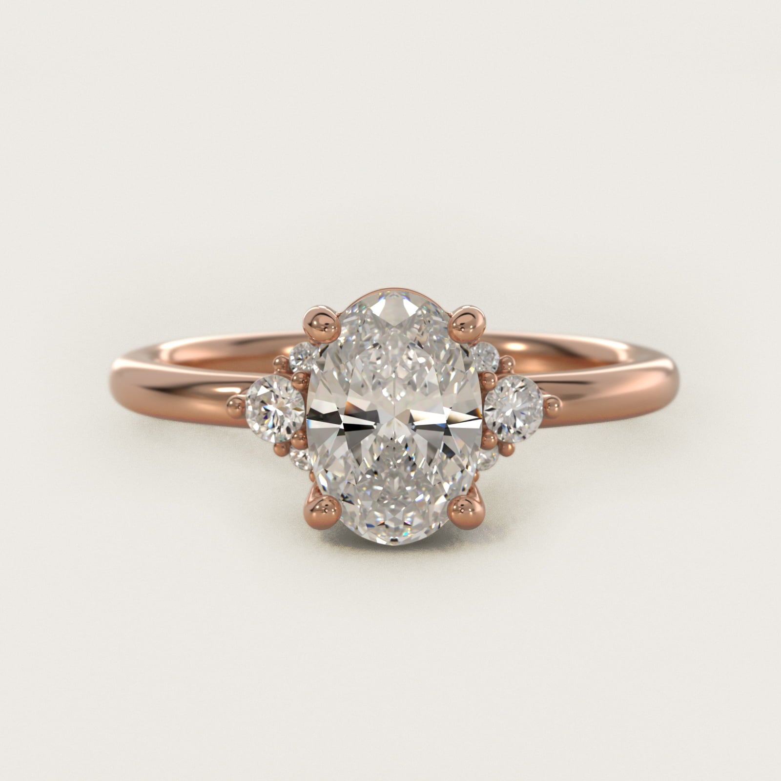 Petite Three Diamond Engagement Ring in 18k Rose Gold (1/10 ct. tw.) - Oval Center