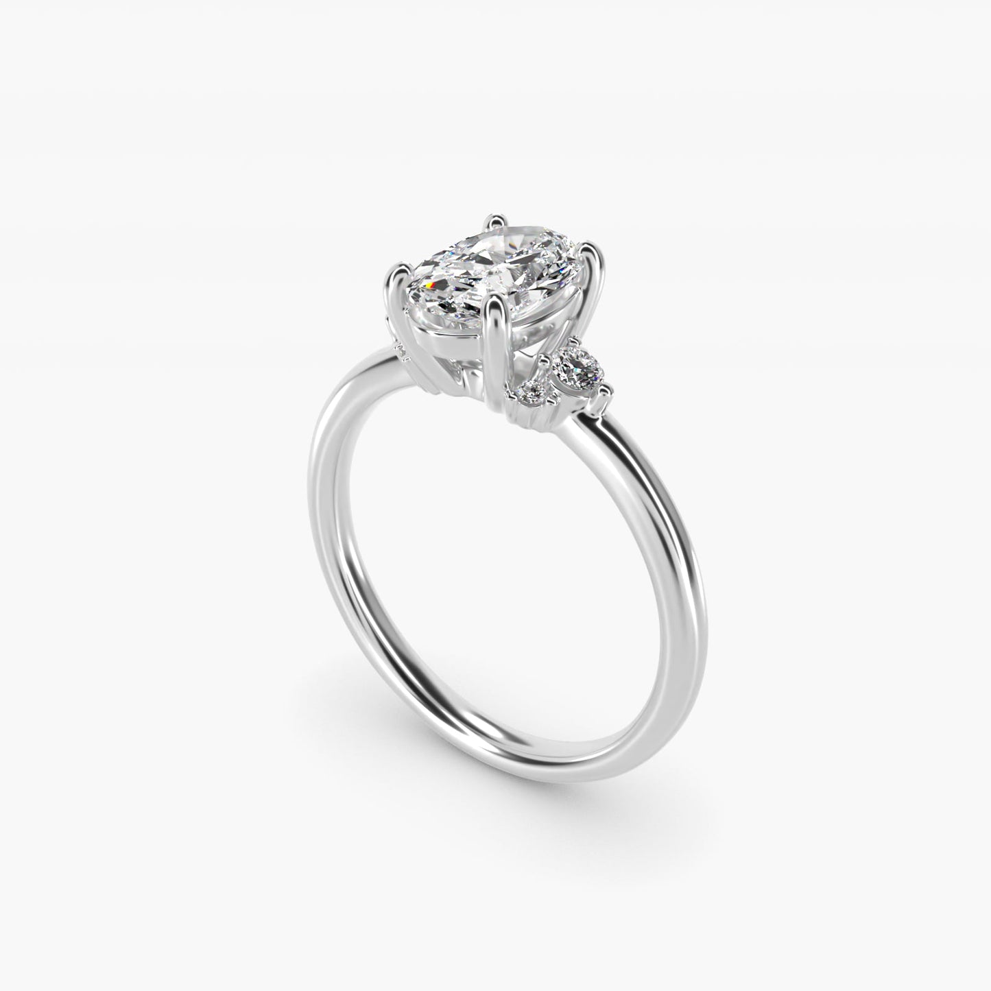 Petite Three Diamond Engagement Ring in 14k White Gold (1/10 ct. tw.) - Oval Center