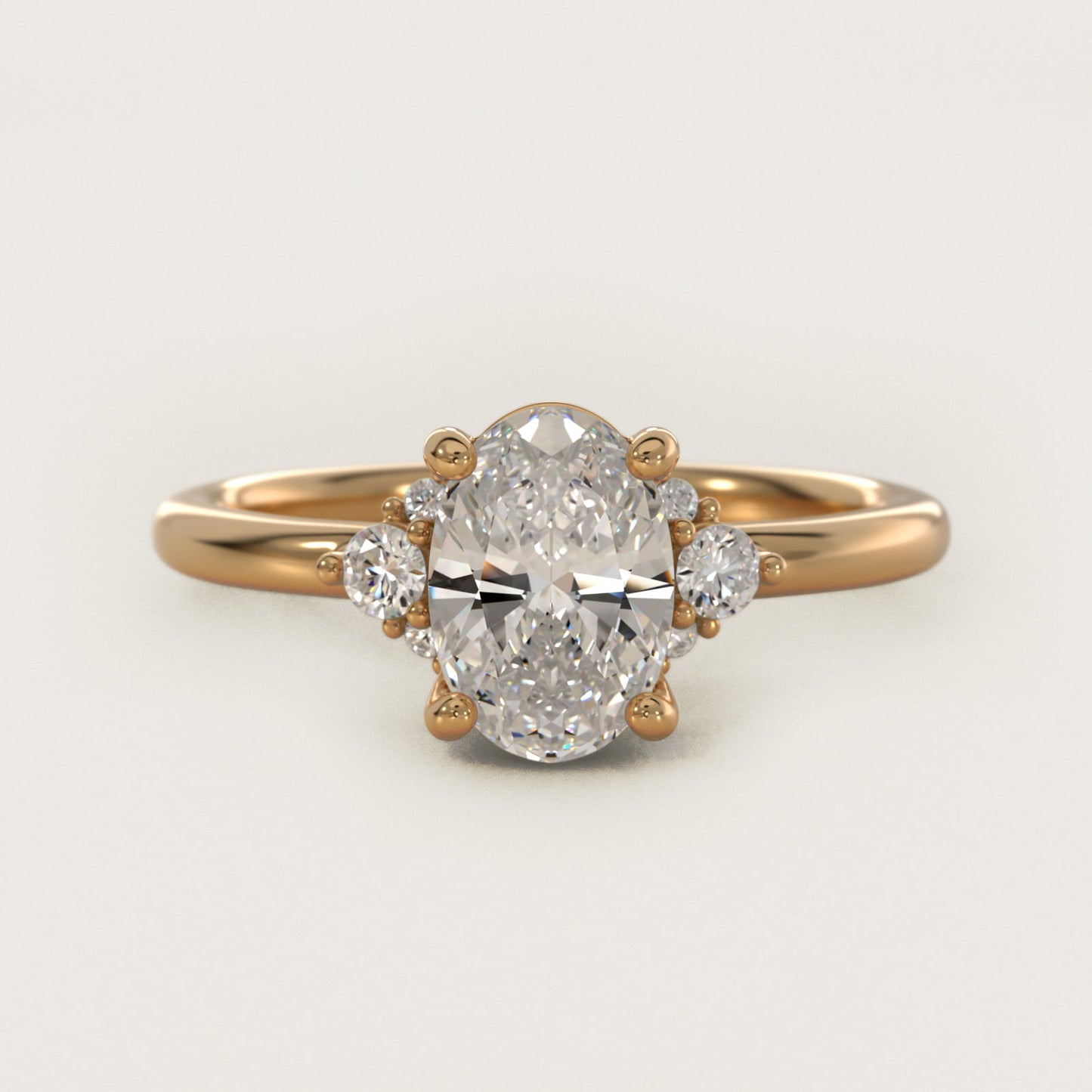 Petite Three Diamond Engagement Ring in 14k Yellow Gold (1/10 ct. tw.) - Oval Center