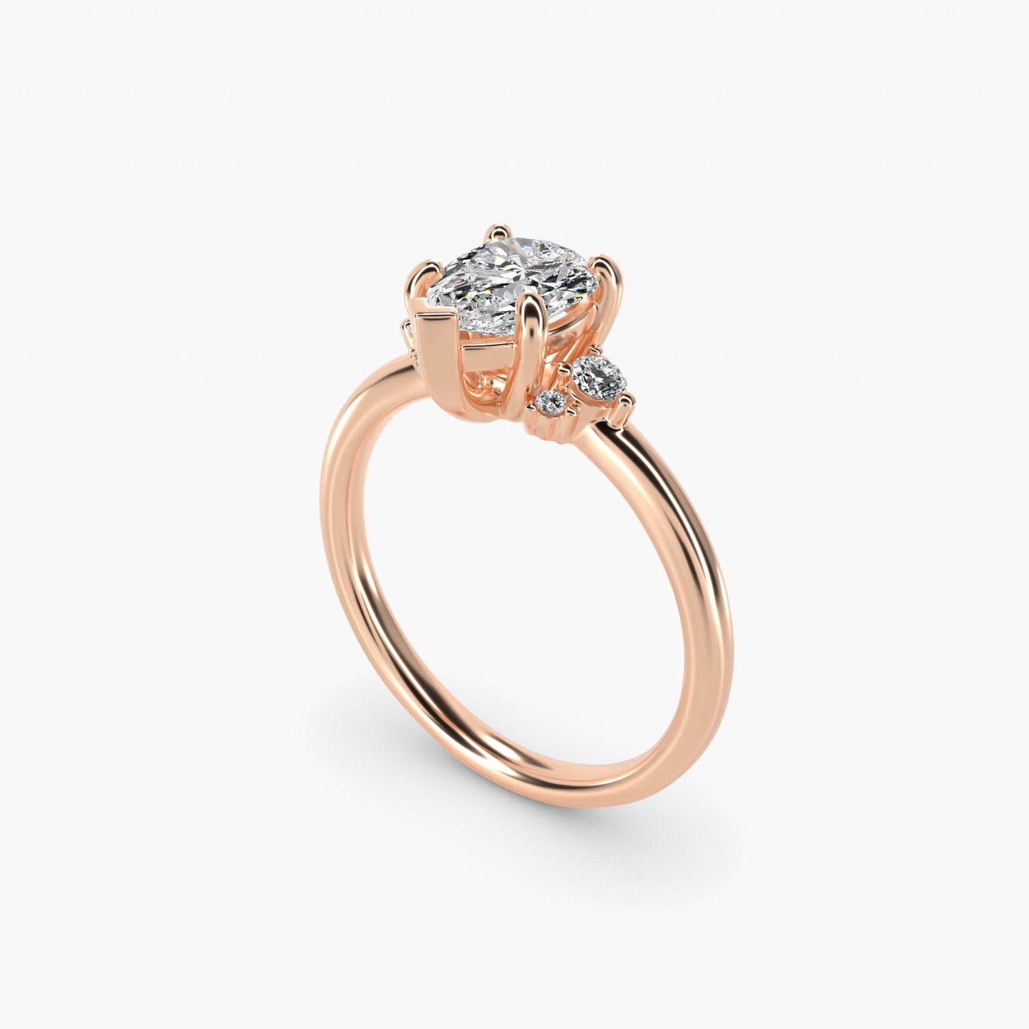 Petite Three Diamond Engagement Ring in 14k Rose Gold (1/10 ct. tw.) - Pear Center