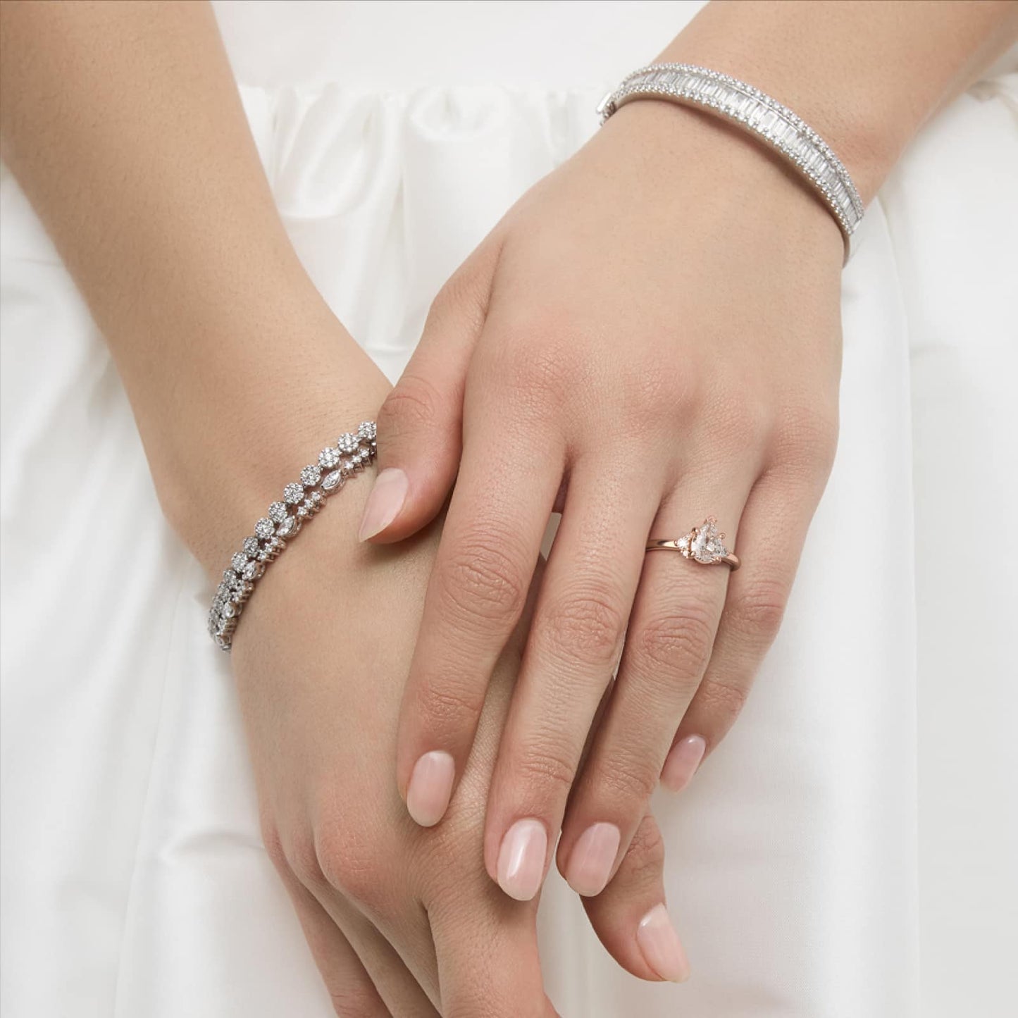 Petite Three Diamond Engagement Ring in 14k Rose Gold (1/10 ct. tw.) - Pear Center