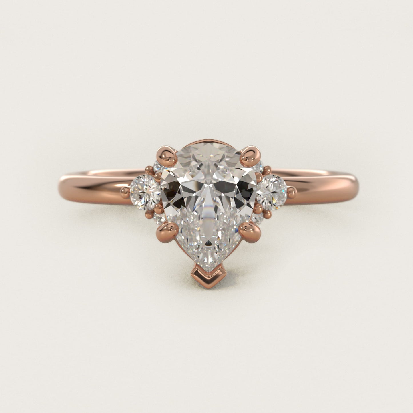Petite Three Diamond Engagement Ring in 18k Rose Gold (1/10 ct. tw.) - Pear Center