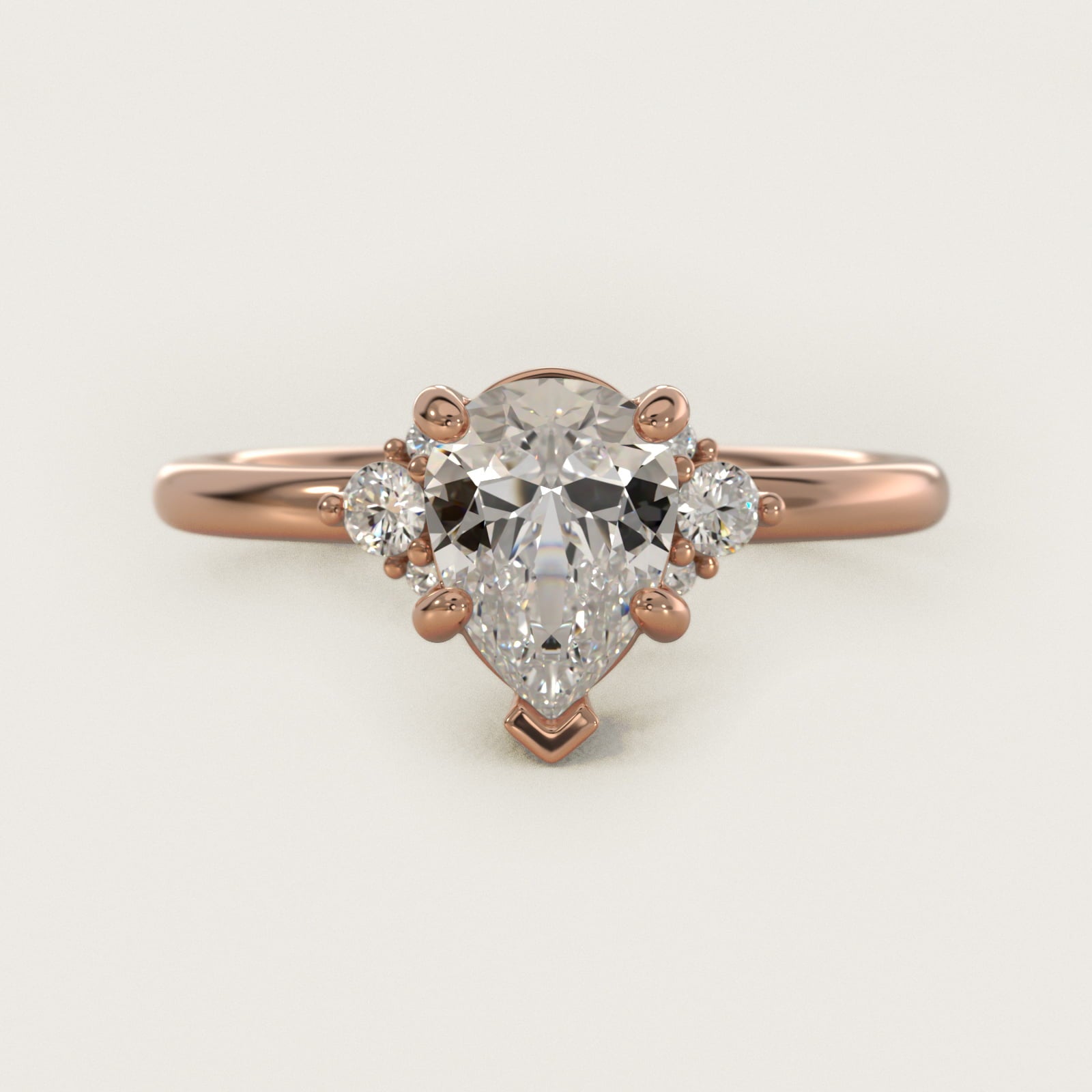 Petite Three Diamond Engagement Ring in 18k Rose Gold (1/10 ct. tw.) - Pear Center