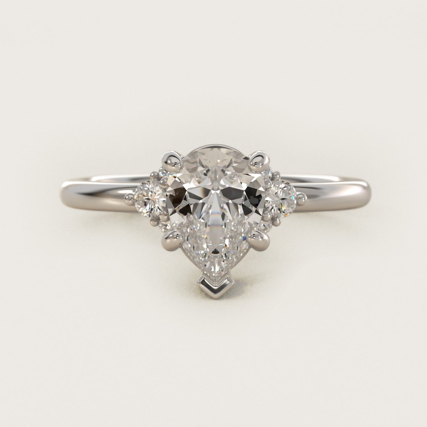 Petite Three Diamond Engagement Ring in Platinum (1/10 ct. tw.) - Pear Center