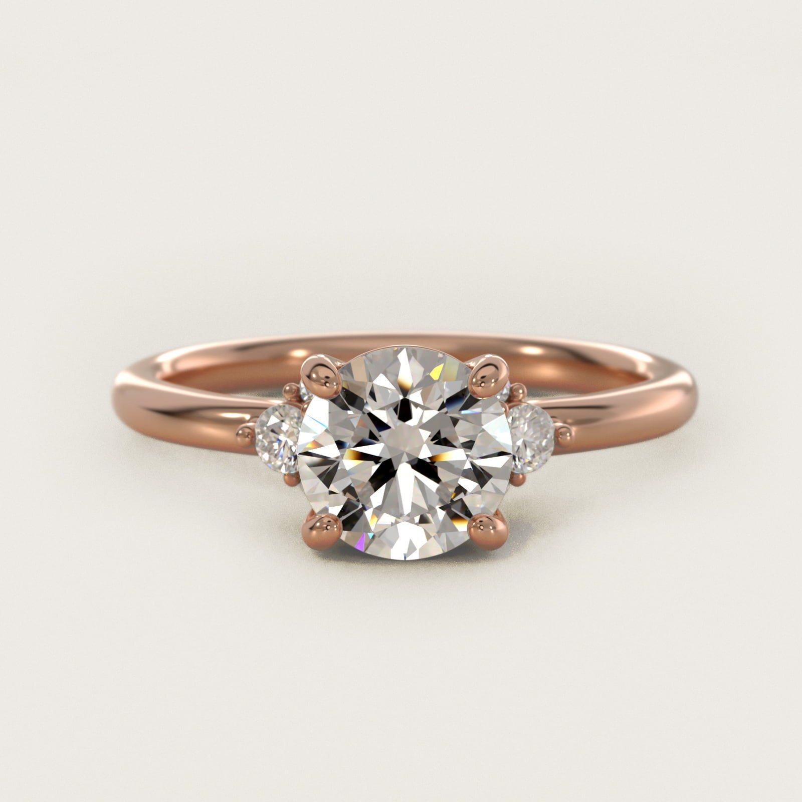 Petite Three Diamond Engagement Ring in 18k Rose Gold (1/10 ct. tw.) - Round Center