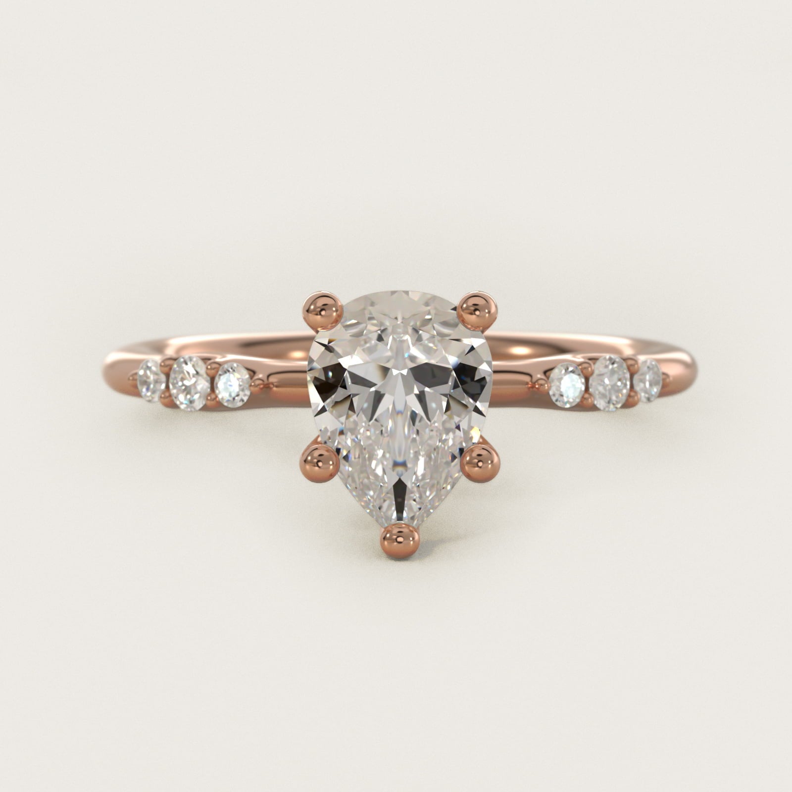 Petite Three Round Diamond Accents Side Stone Engagement Ring In 14K Rose Gold By James Allen - Pear Center