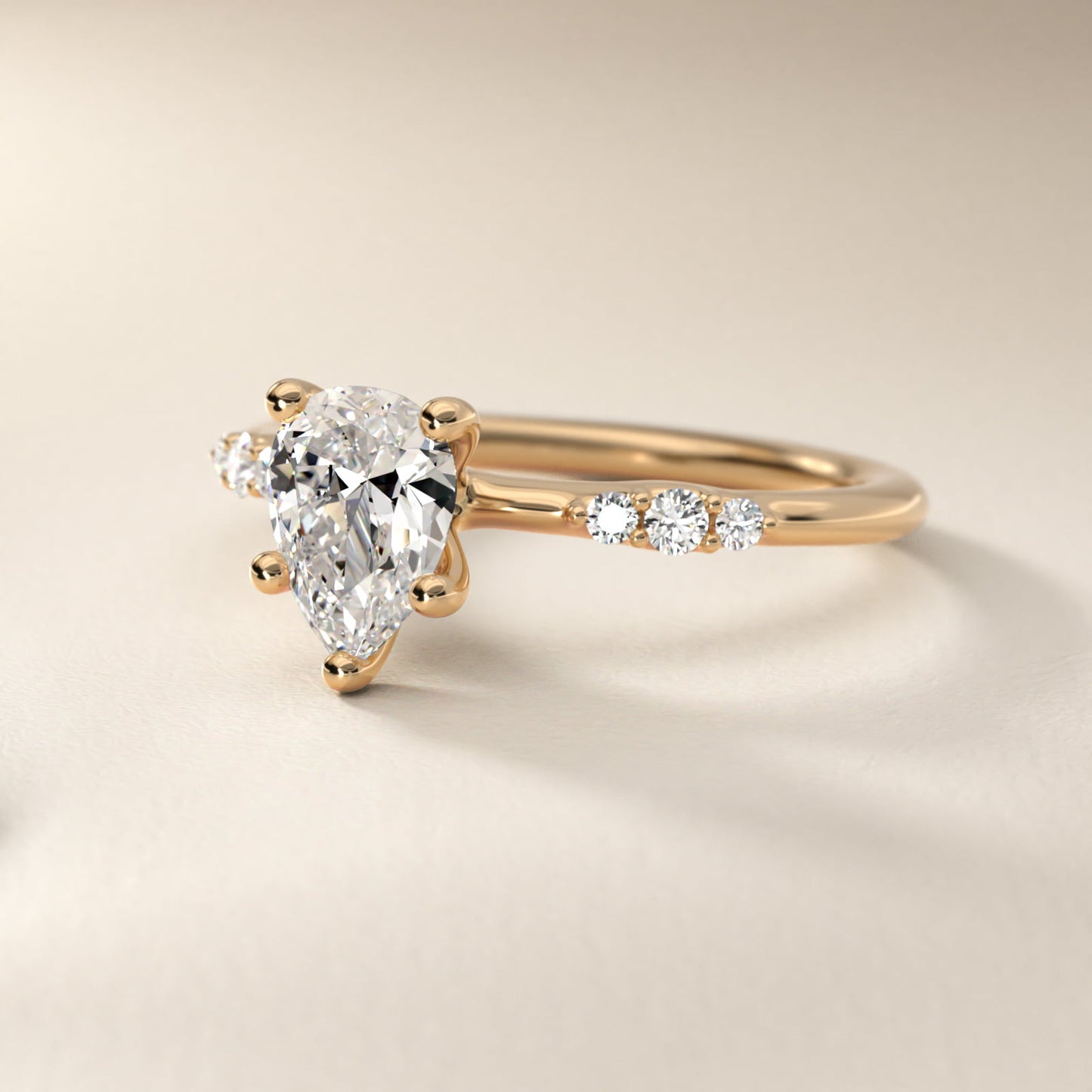 Petite Three Round Diamond Accents Side Stone Engagement Ring In 14K Yellow Gold By James Allen - Pear Center