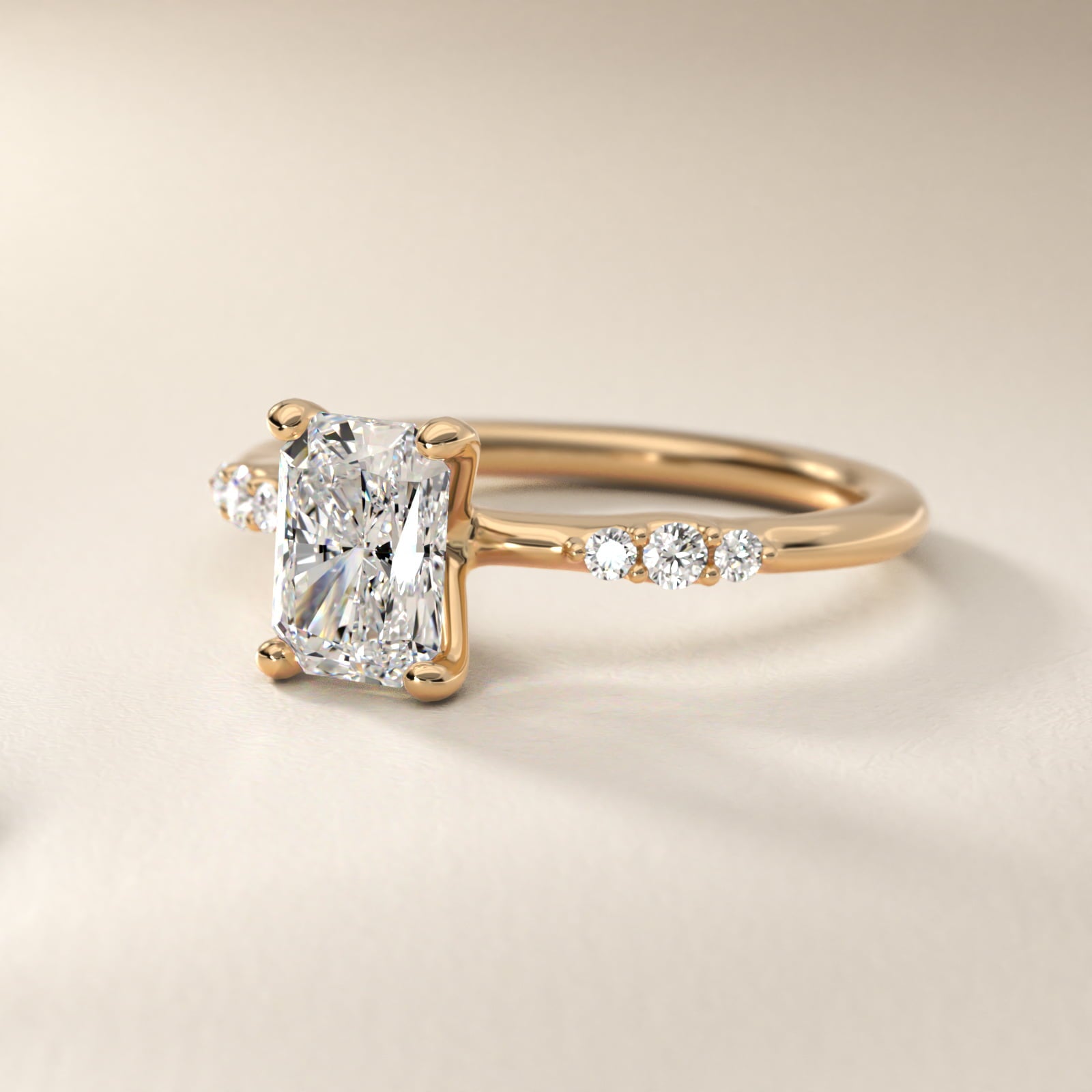 Petite Three Round Diamond Accents Side Stone Engagement Ring In 14K Yellow Gold By James Allen - Radiant Center