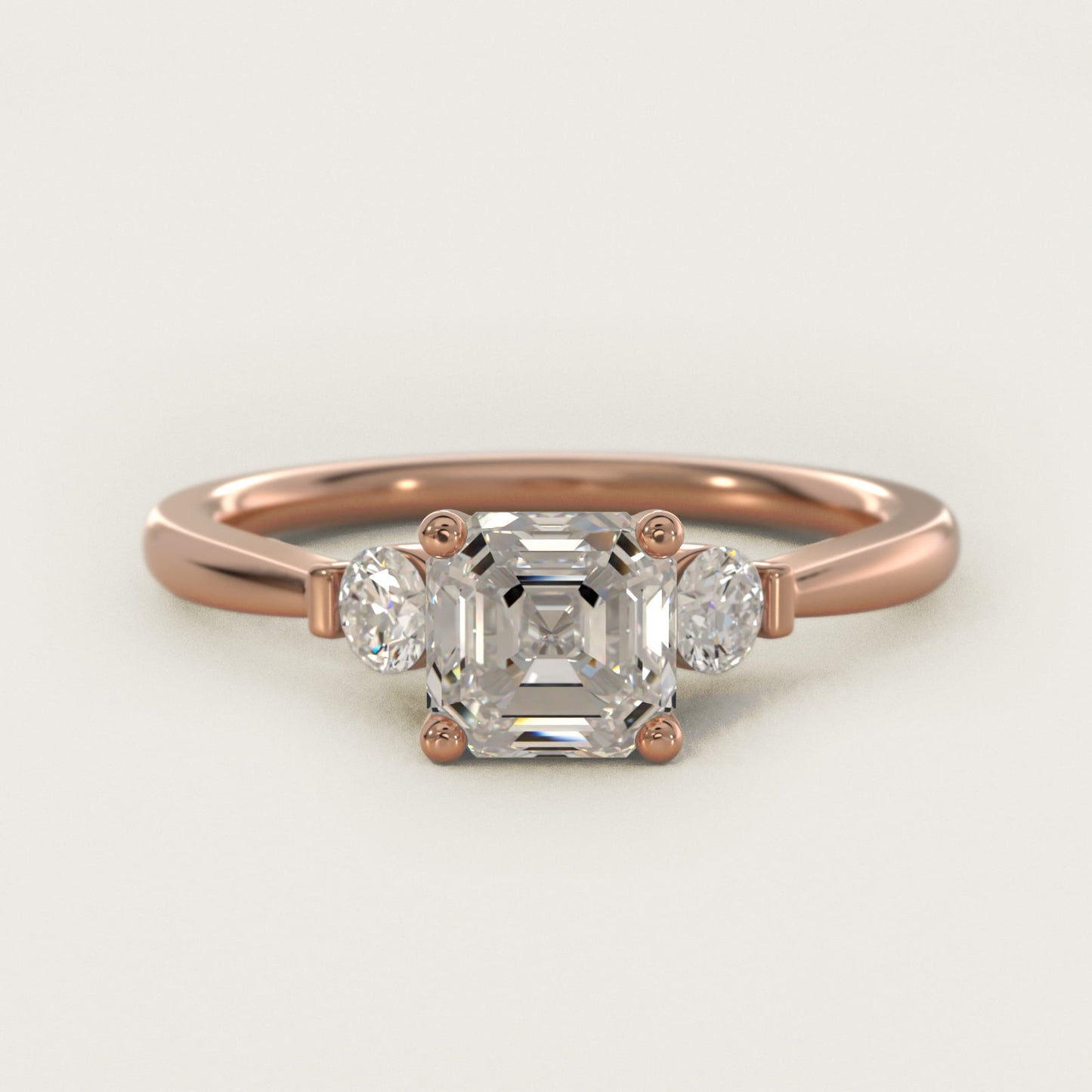 Petite Three-Stone Diamond Engagement Ring in 14k Rose Gold - Asscher Center