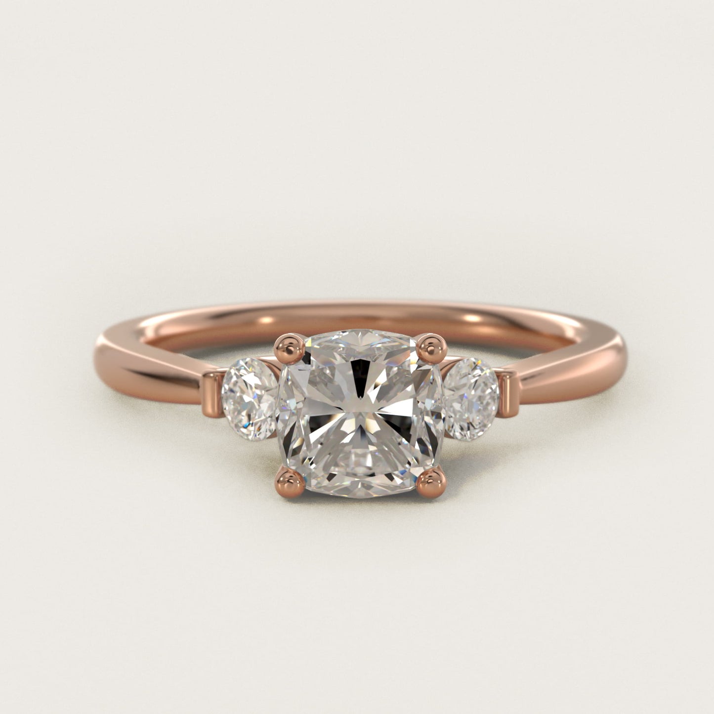 Petite Three-Stone Diamond Engagement Ring in 14k Rose Gold - Cushion Center