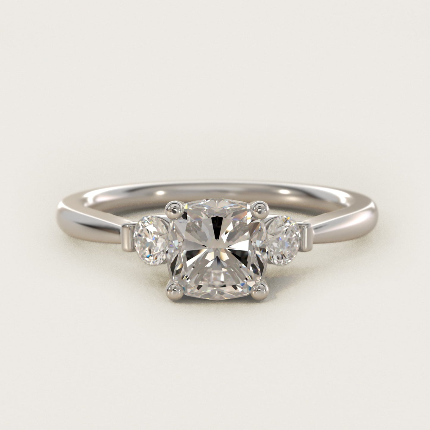 Petite Three-Stone Diamond Engagement Ring in Platinum - Cushion Center