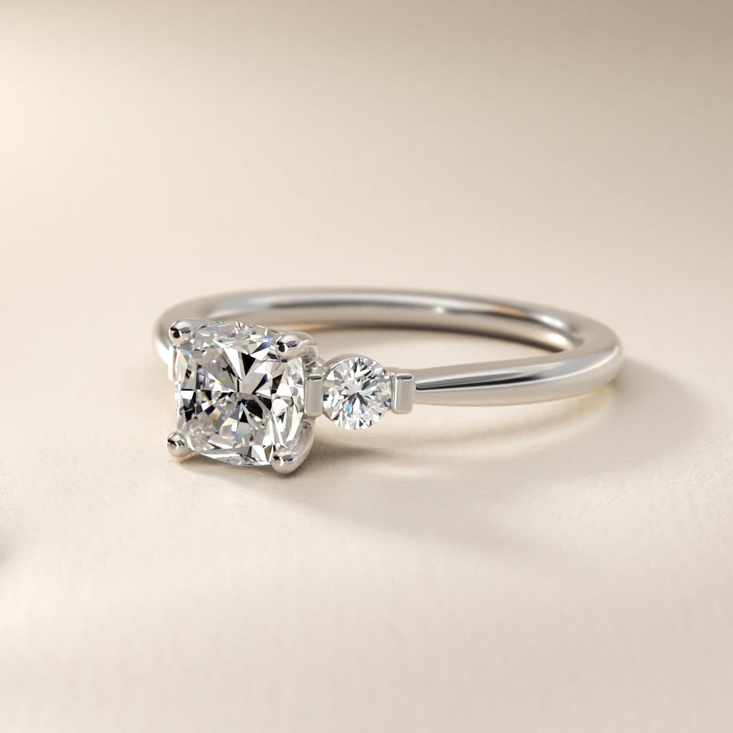 Petite Three-Stone Diamond Engagement Ring in Platinum - Cushion Center