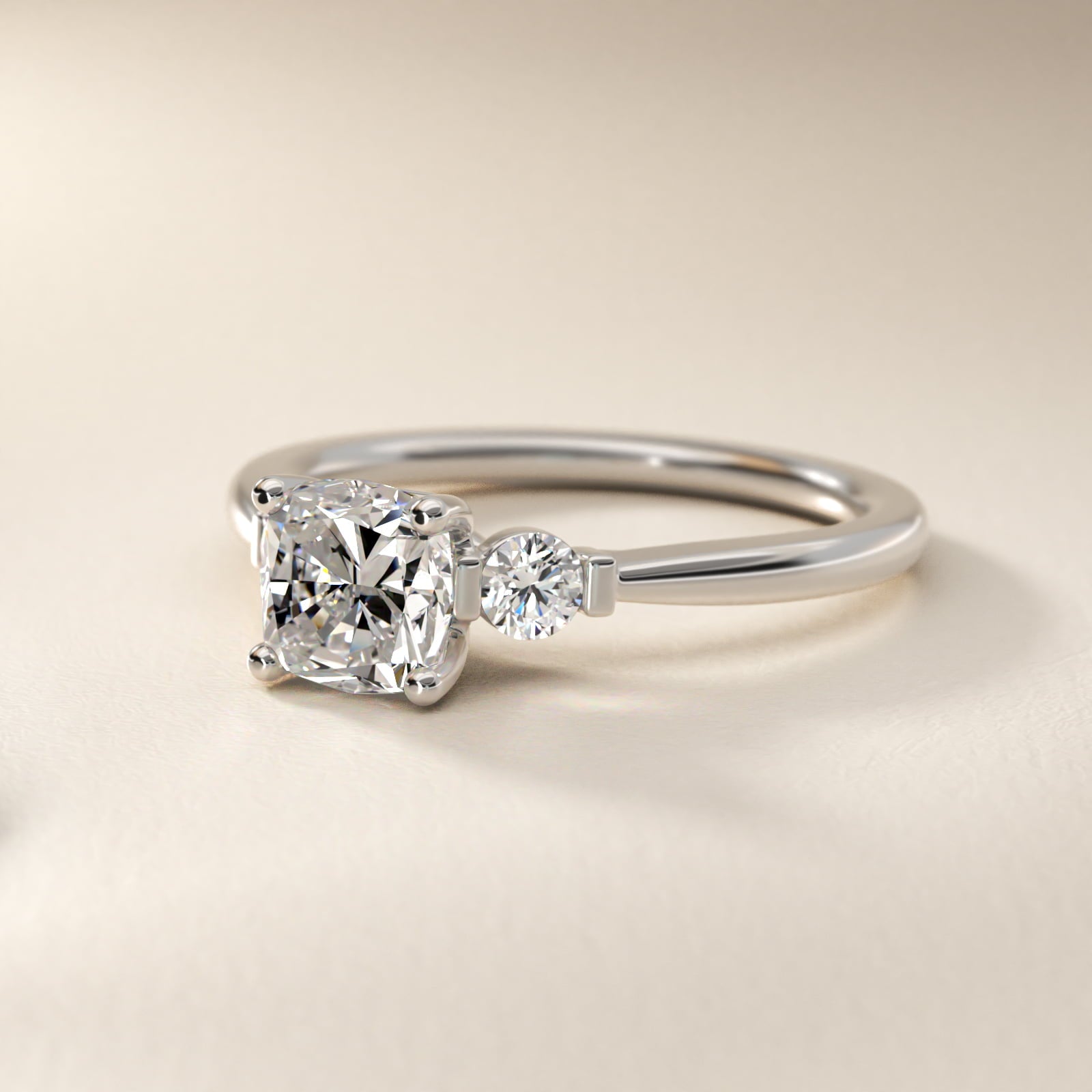 Petite Three-Stone Diamond Engagement Ring in Platinum - Cushion Center