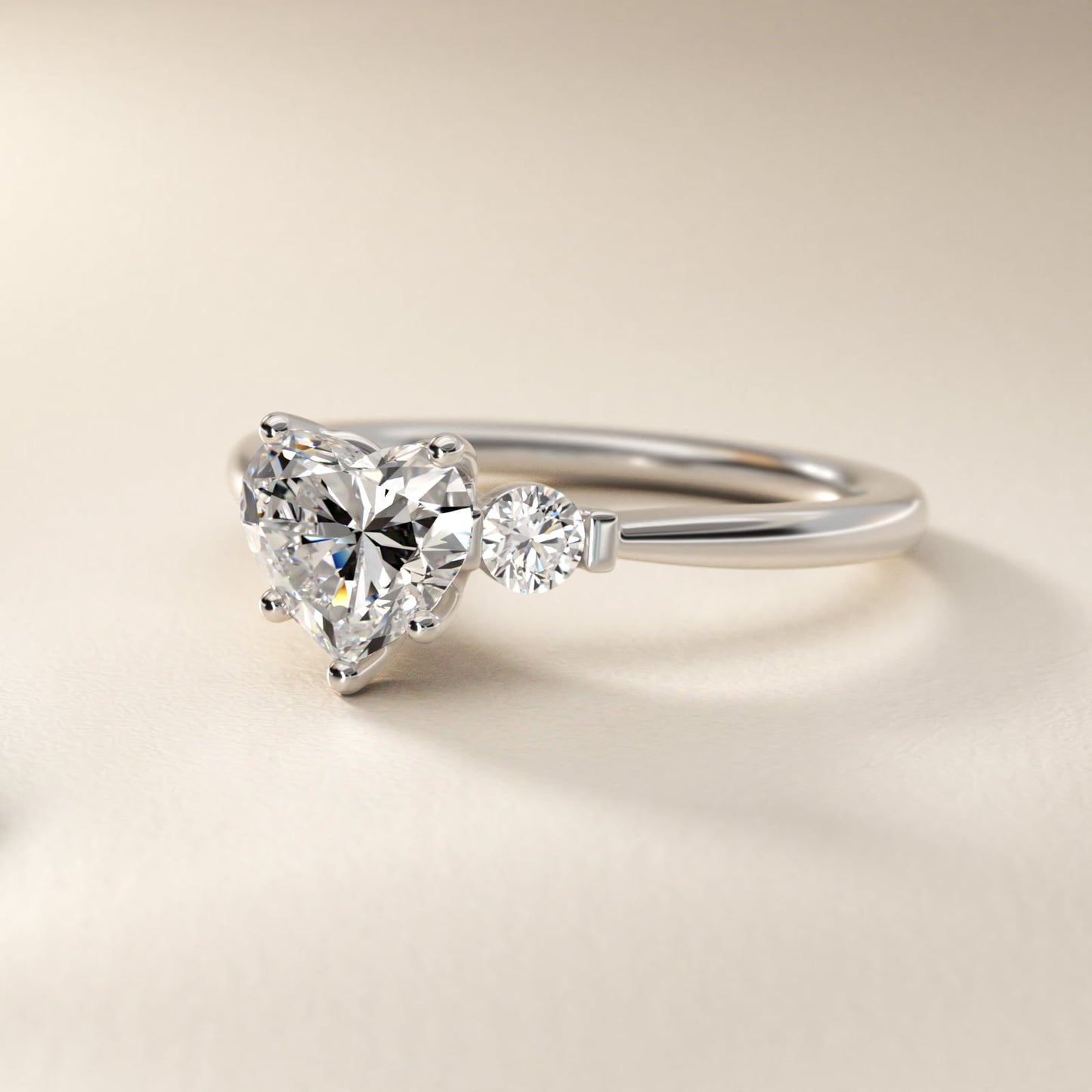 Petite Three-Stone Diamond Engagement Ring in Platinum - Heart Center