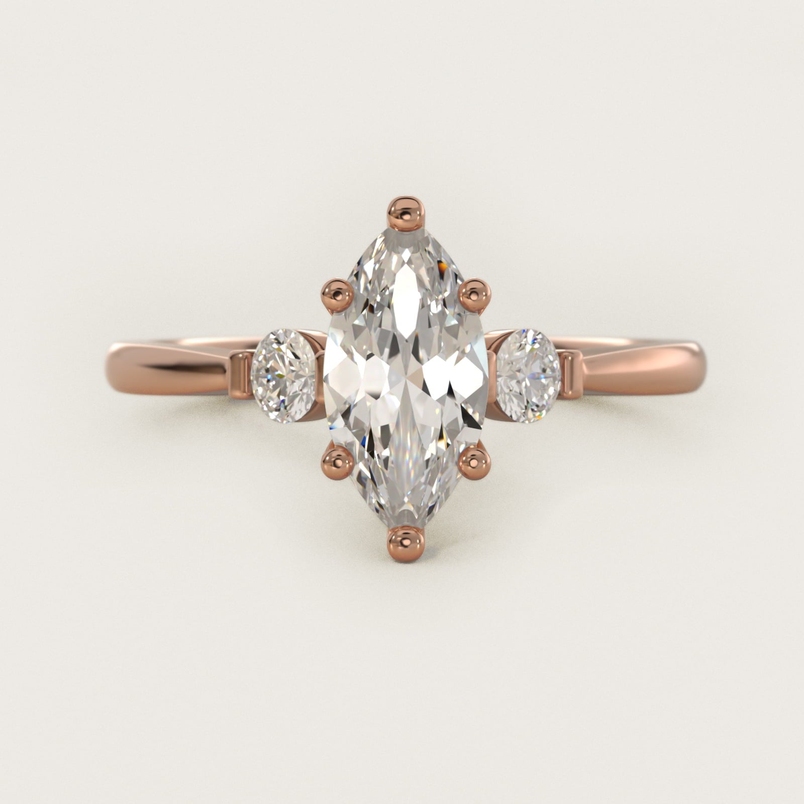 Petite Three-Stone Diamond Engagement Ring in 14k Rose Gold - Marquise Center