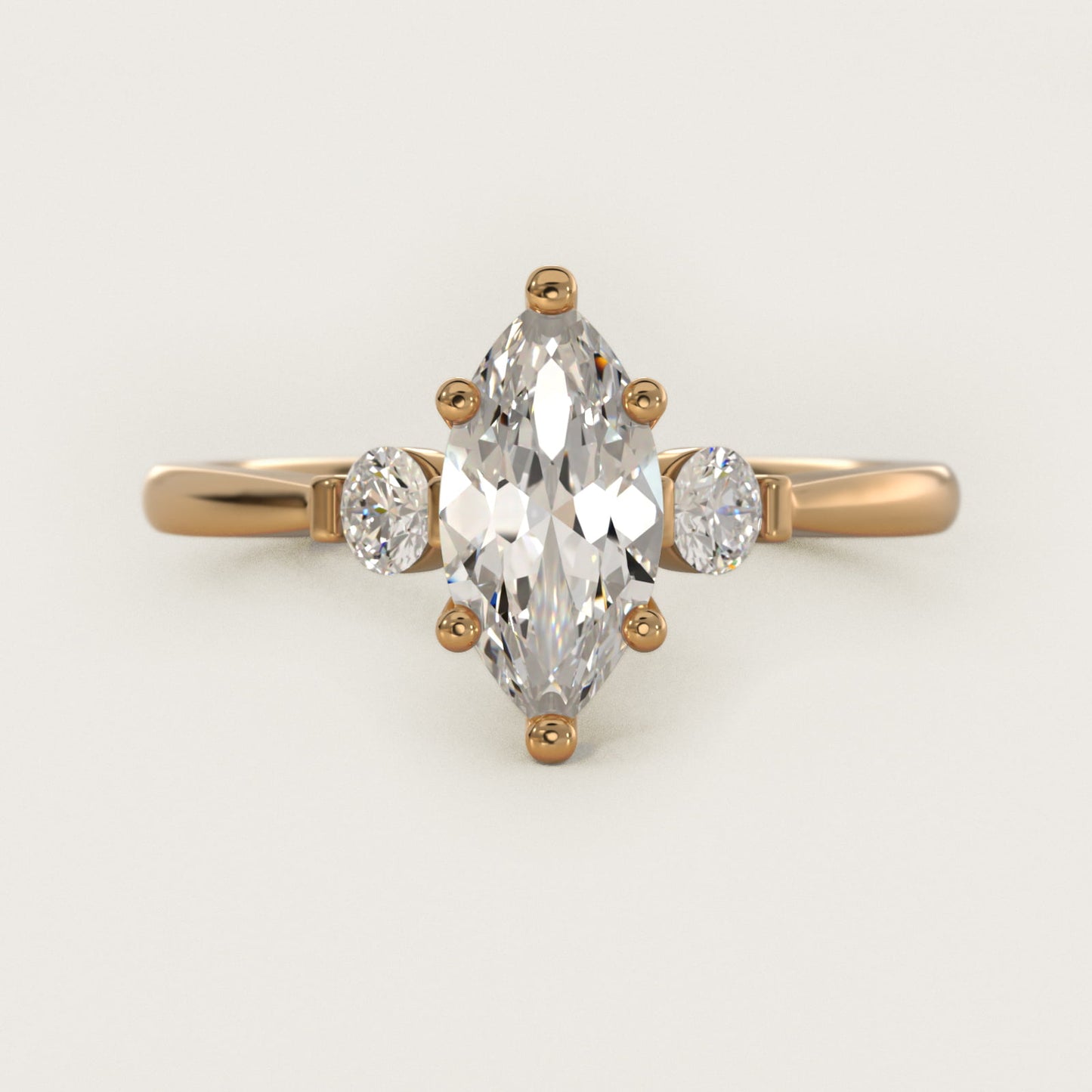Petite Three-Stone Diamond Engagement Ring in 14k Yellow Gold - Marquise Center