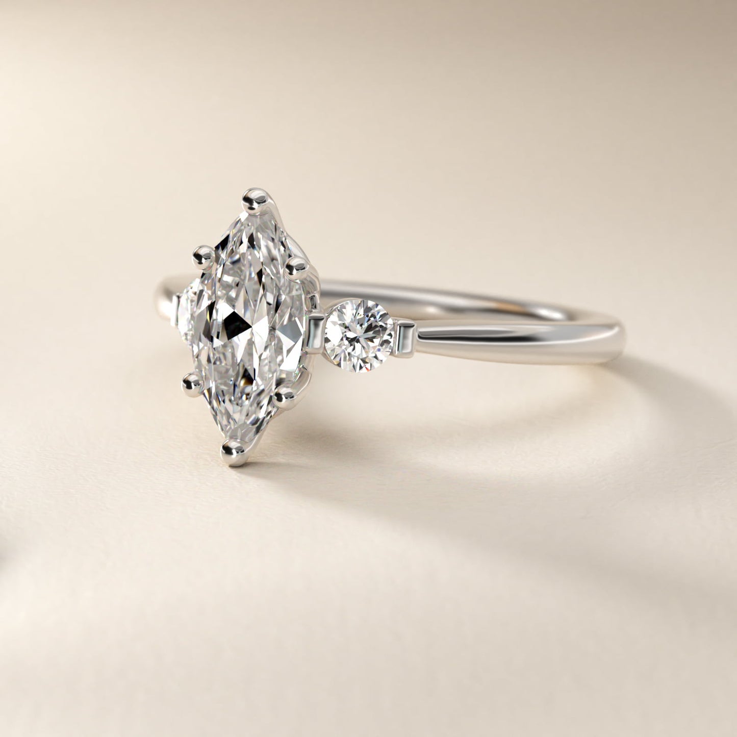 Petite Three-Stone Diamond Engagement Ring in Platinum - Marquise Center