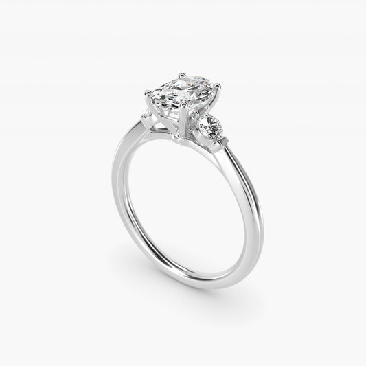 Petite Three-Stone Diamond Engagement Ring in Platinum - Oval Center