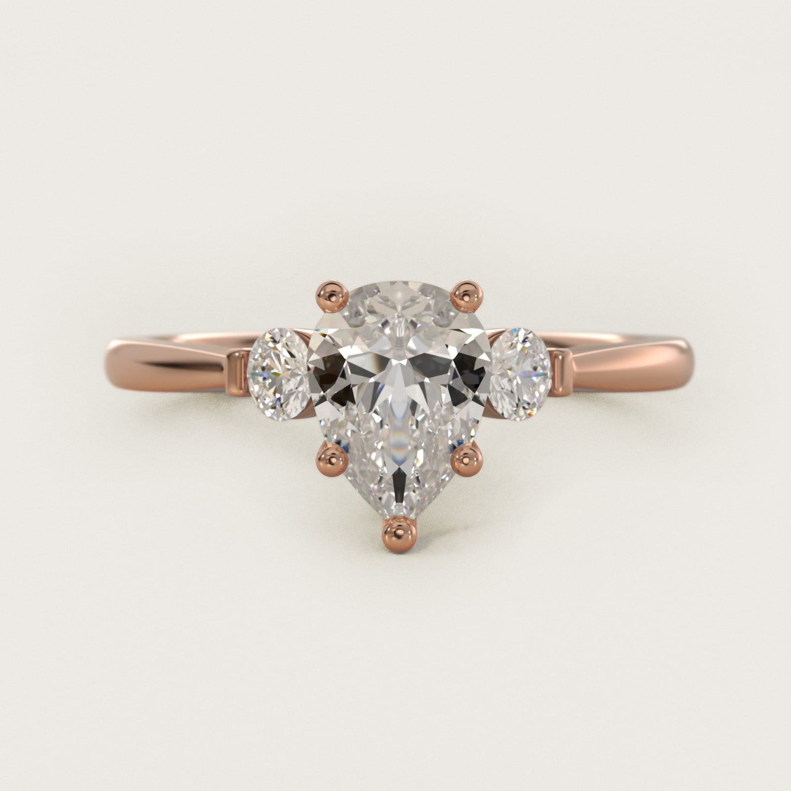 Petite Three-Stone Diamond Engagement Ring in 18k Rose Gold - Pear Center