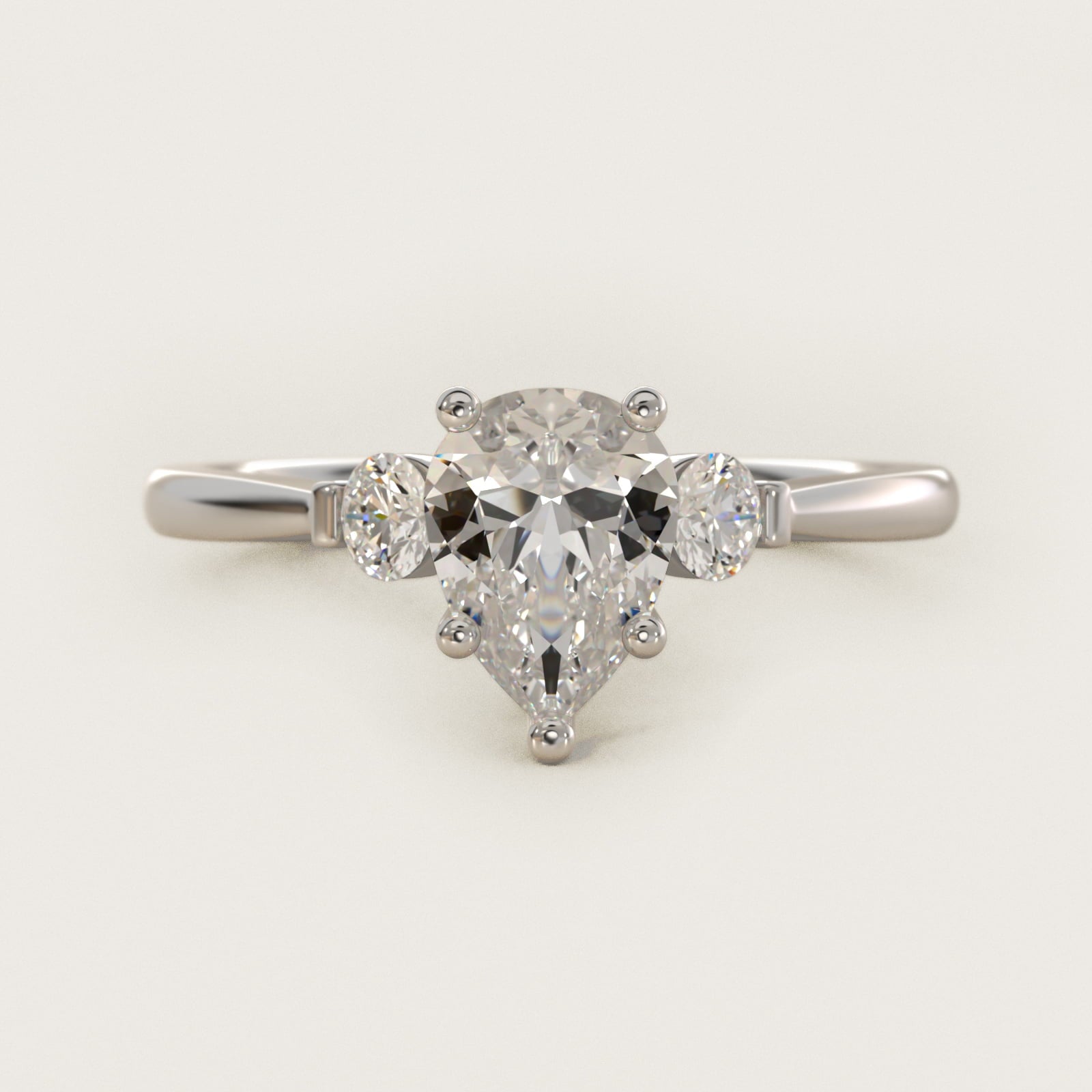 Petite Three-Stone Diamond Engagement Ring in 18k White Gold - Pear Center