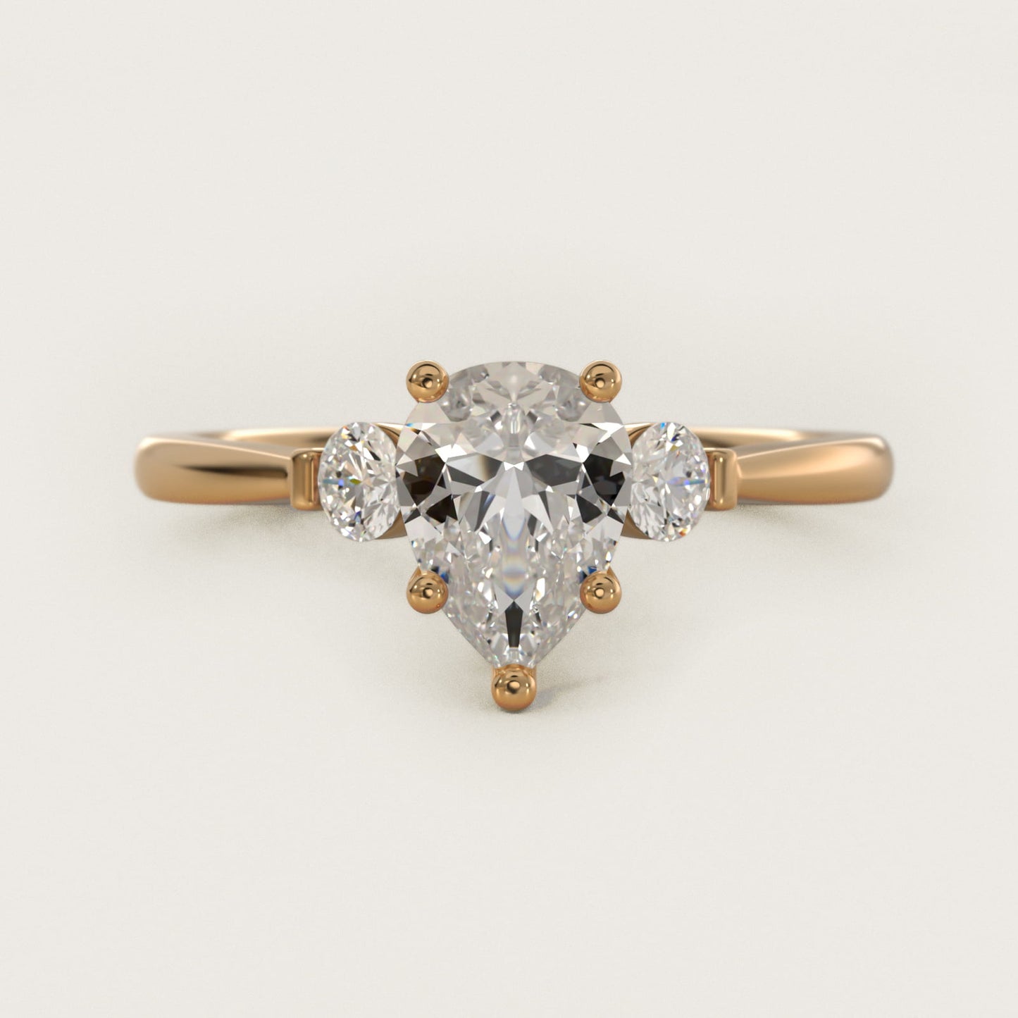 Petite Three-Stone Diamond Engagement Ring in 18k Yellow Gold - Pear Center