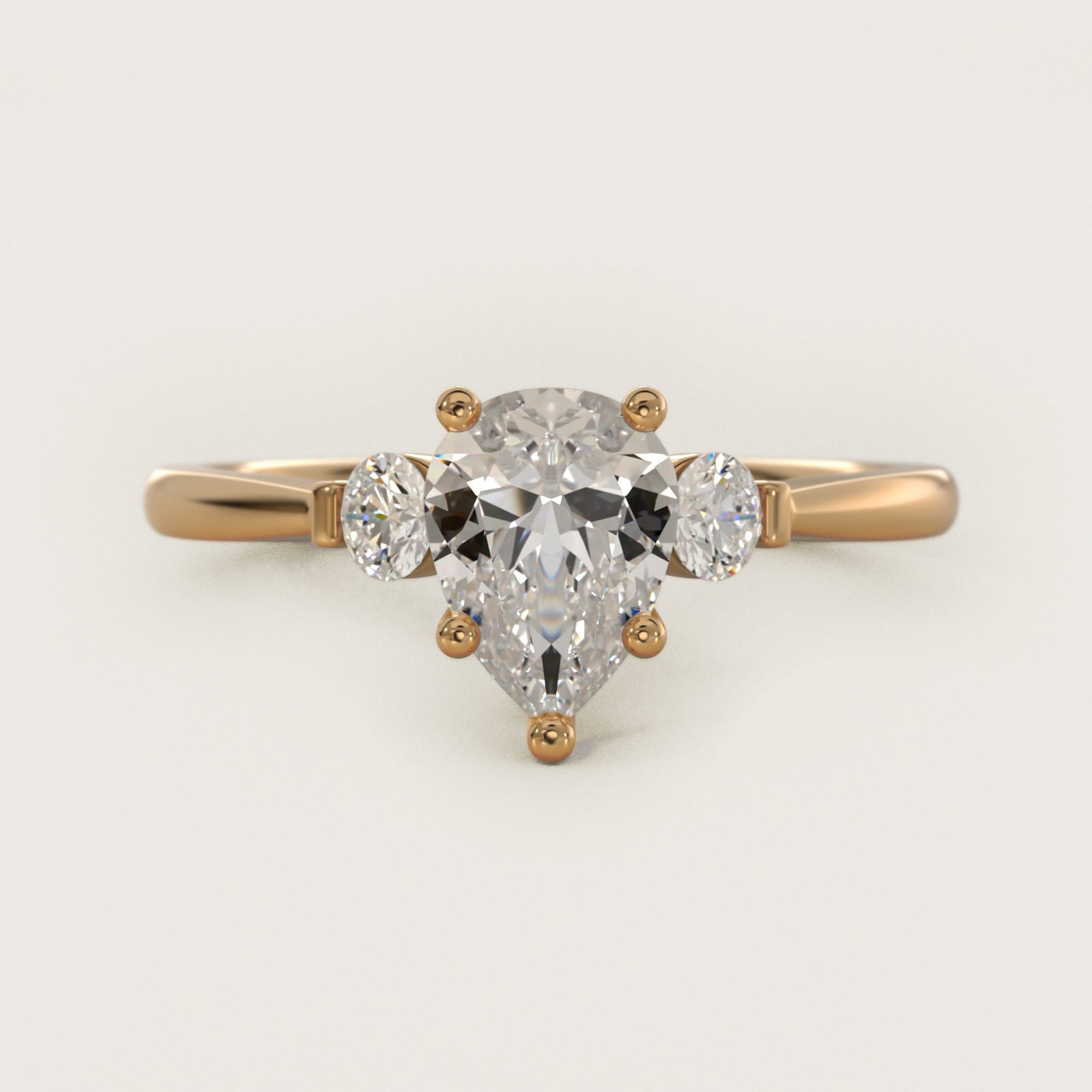 Petite Three-Stone Diamond Engagement Ring in 18k Yellow Gold - Pear Center