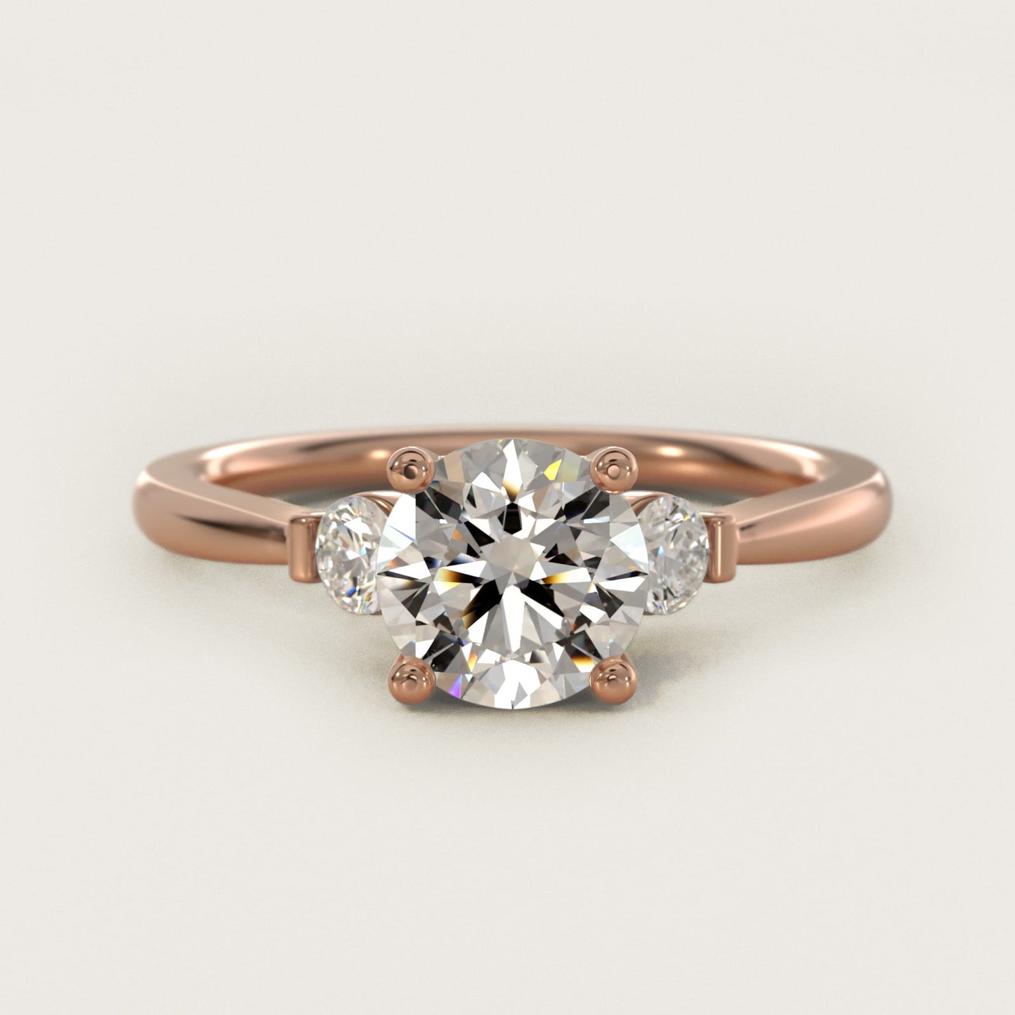Petite Three-Stone Diamond Engagement Ring in 18k Rose Gold - Round Center