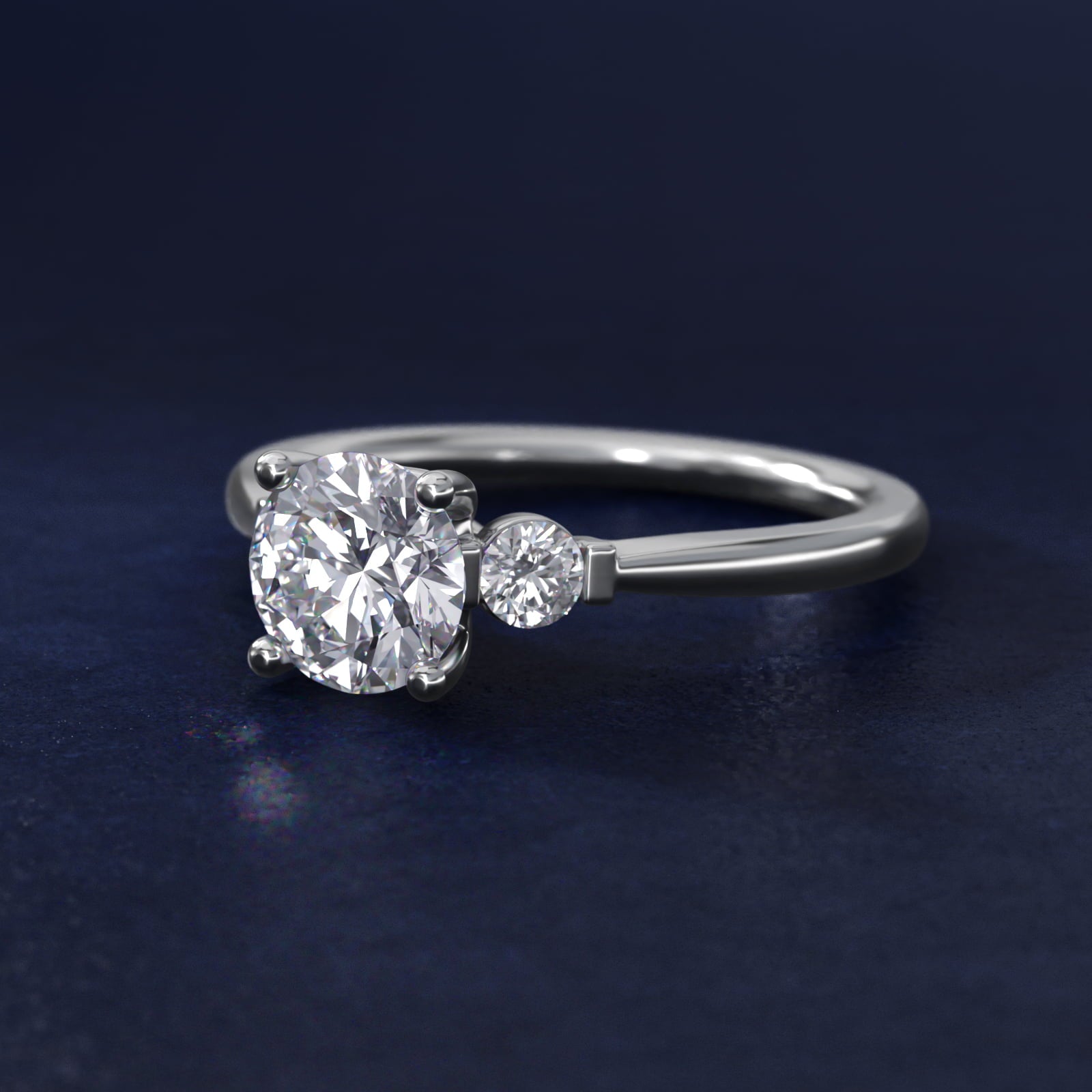 Petite Three-Stone Diamond Engagement Ring in 18k White Gold - Round Center