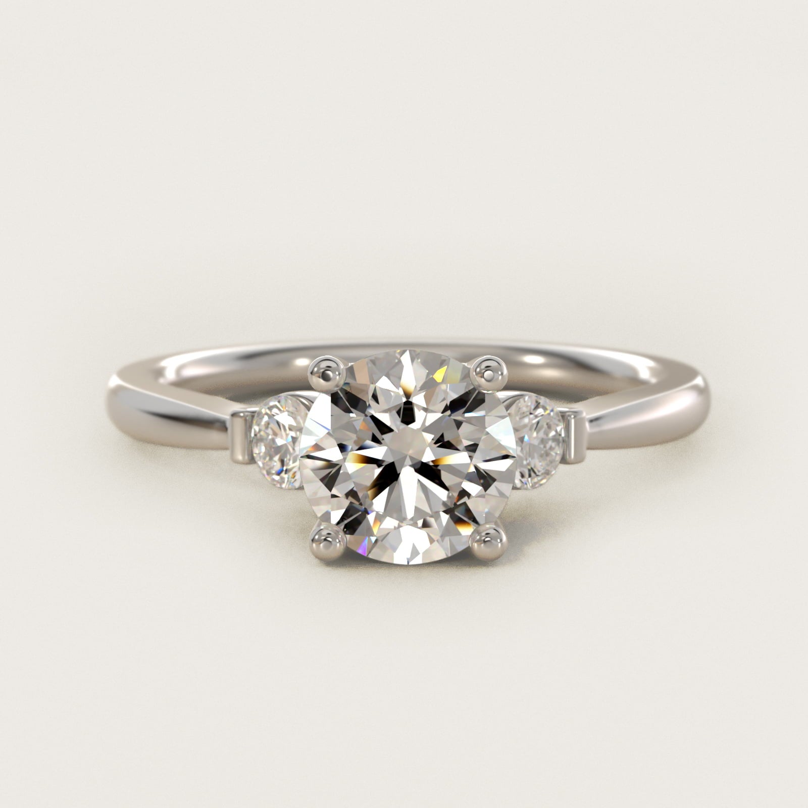 Petite Three-Stone Diamond Engagement Ring in Platinum - Round Center