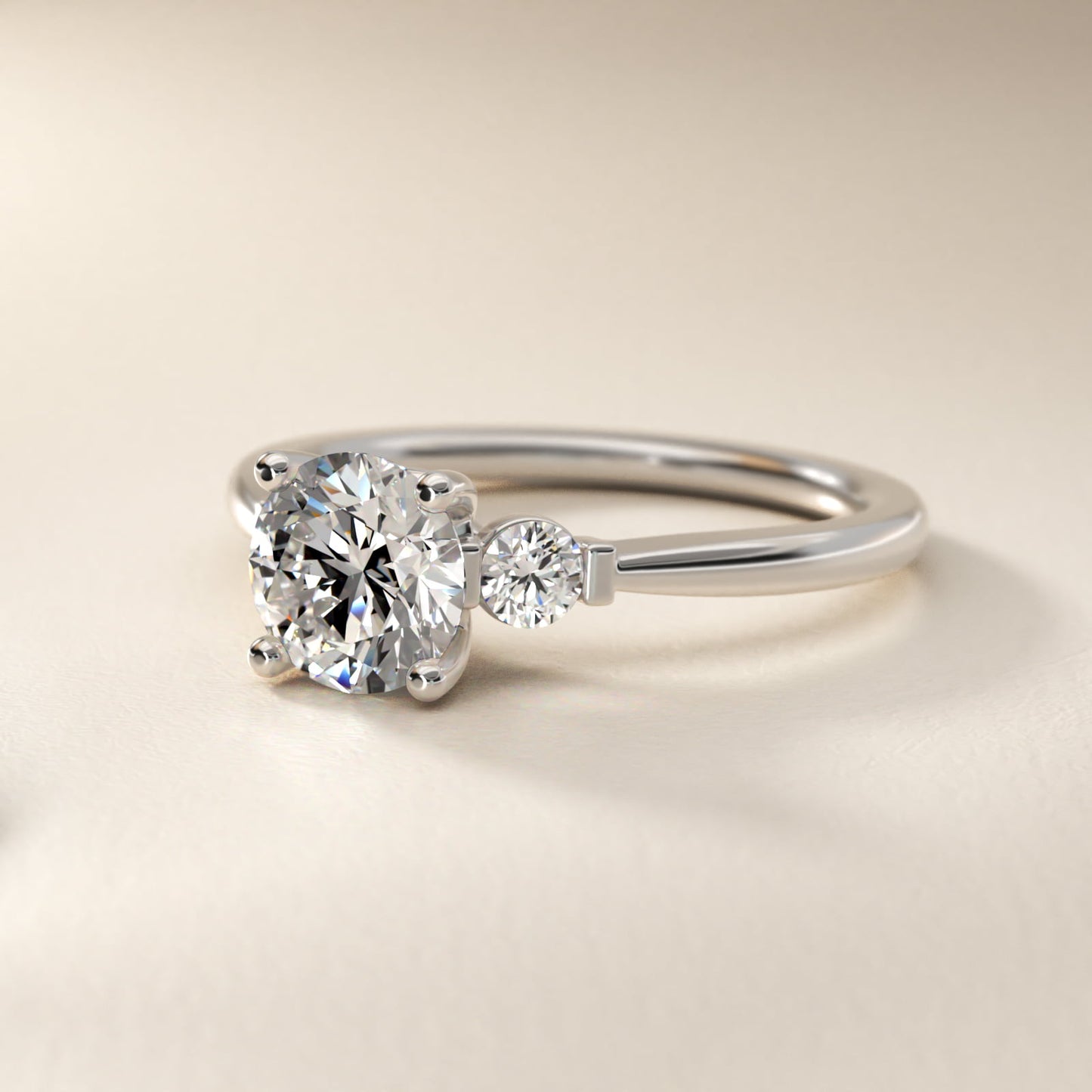 Petite Three-Stone Diamond Engagement Ring in Platinum - Round Center