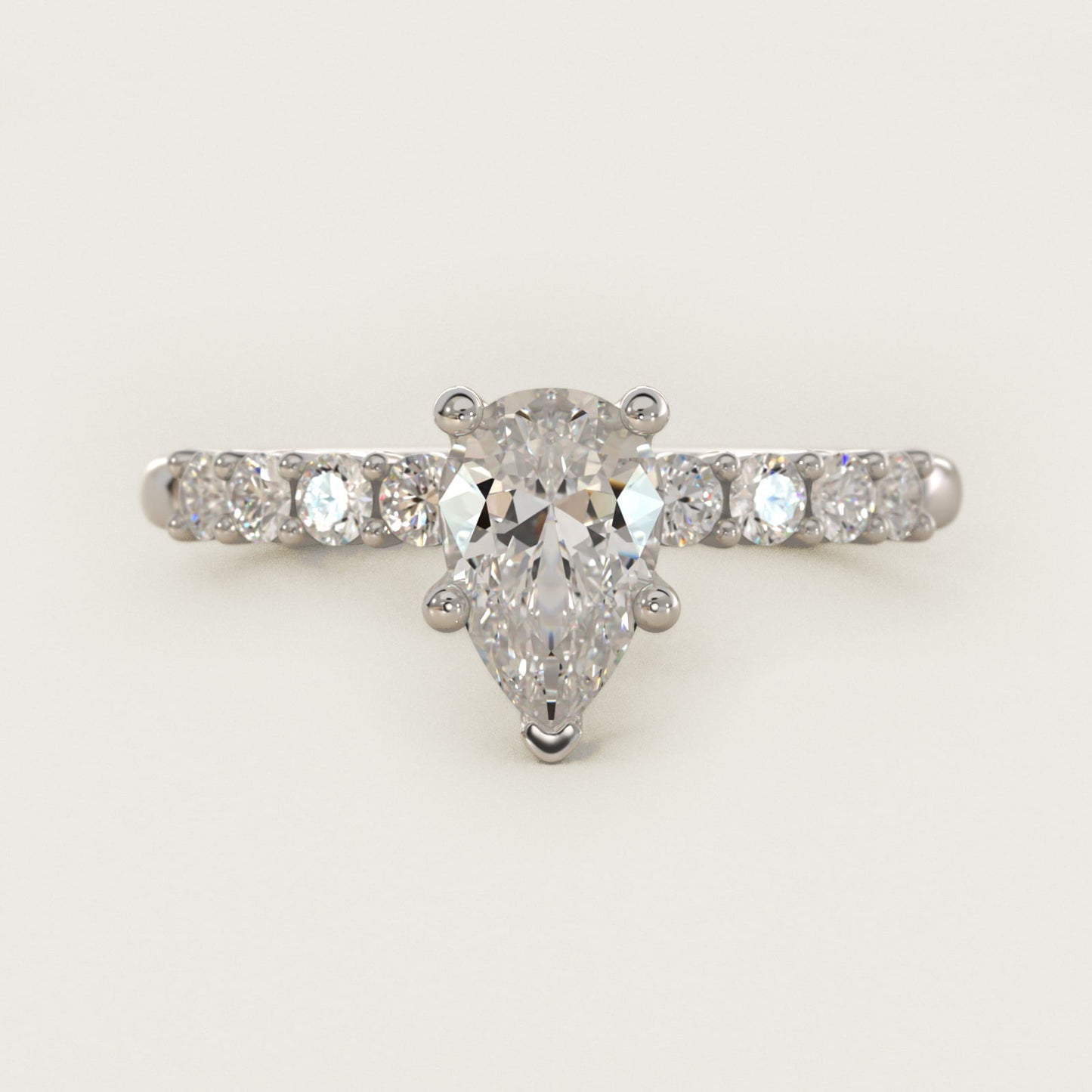 Prong Set Side Stone Diamond Engagement Ring In 18k White Gold By James Allen - Pear Center