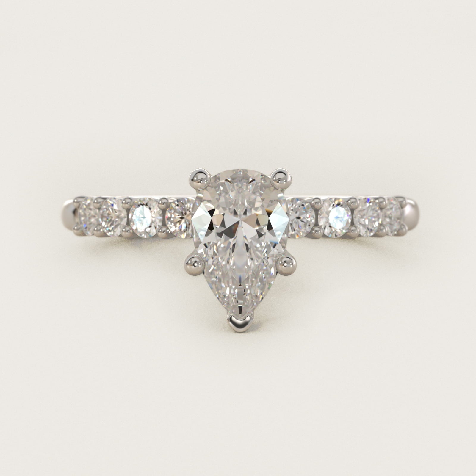 Prong Set Side Stone Diamond Engagement Ring In 18k White Gold By James Allen - Pear Center
