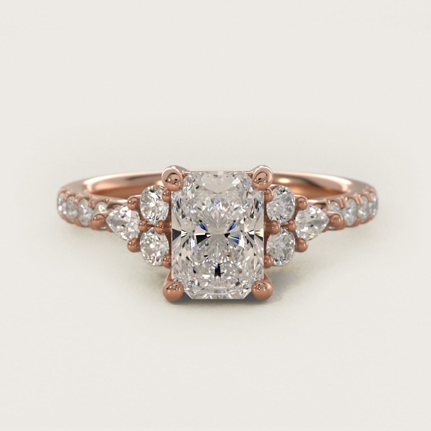 Romantic Round and Pear Cluster Diamond Engagement Ring in 14k Rose Gold (1/3 ct. tw.) - Radiant Center