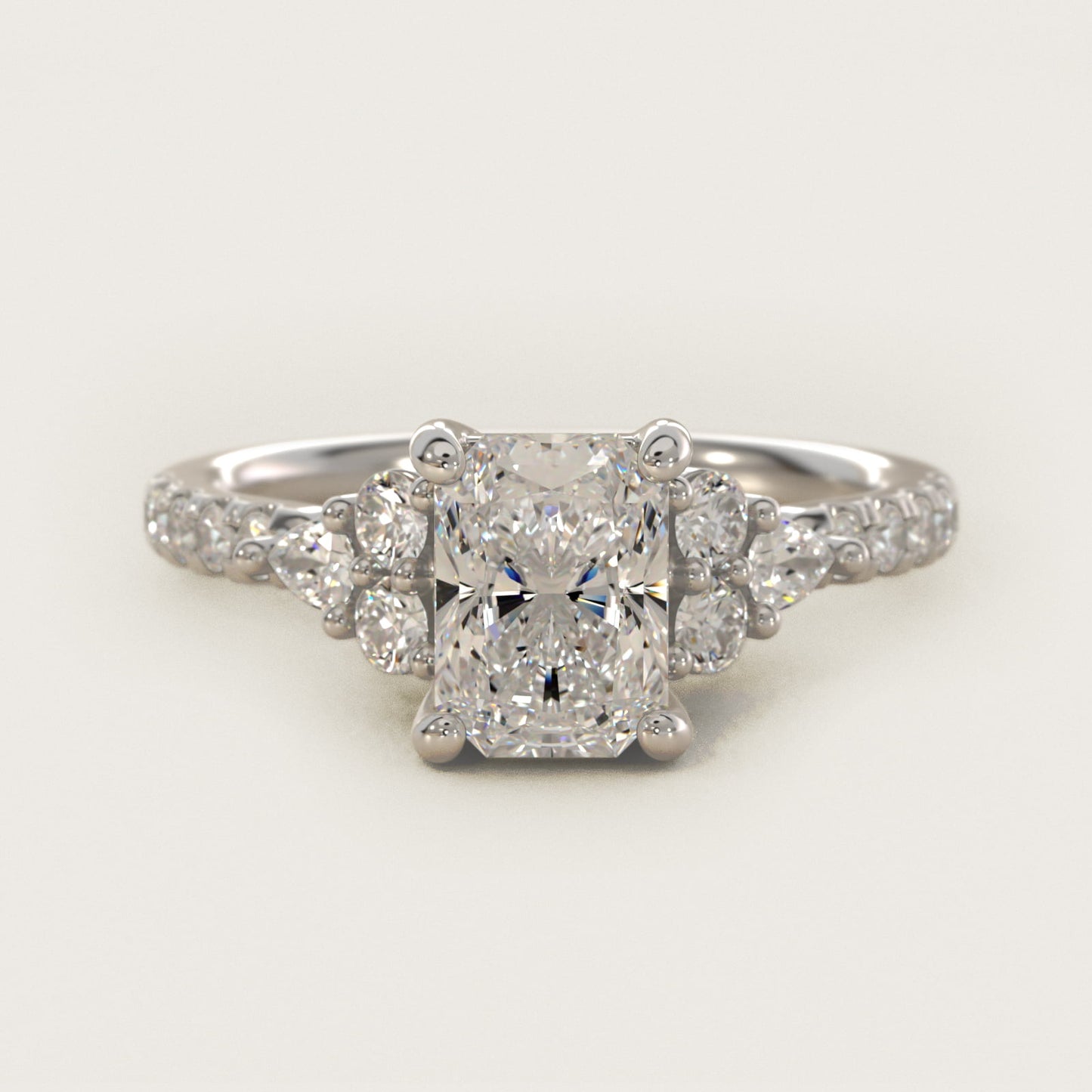 Romantic Round and Pear Cluster Diamond Engagement Ring in 18k White Gold (1/3 ct. tw.) - Radiant Center