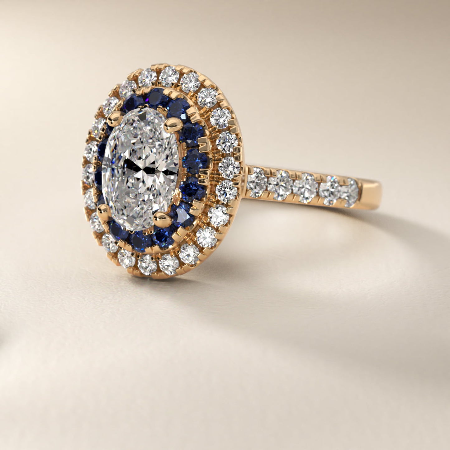 Sapphire and Diamond Double Halo Engagement Ring in 18k Yellow Gold (1/2 ct. tw.) - Oval Center
