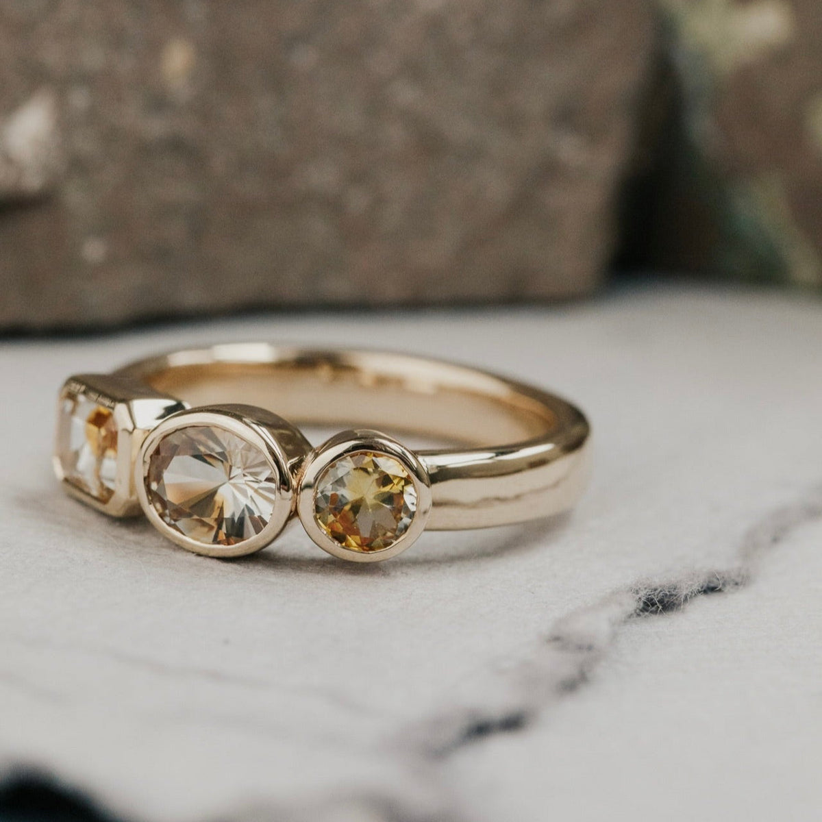 The Blaine Round, Oval, and Emerald Cut Montana Sapphire Ring