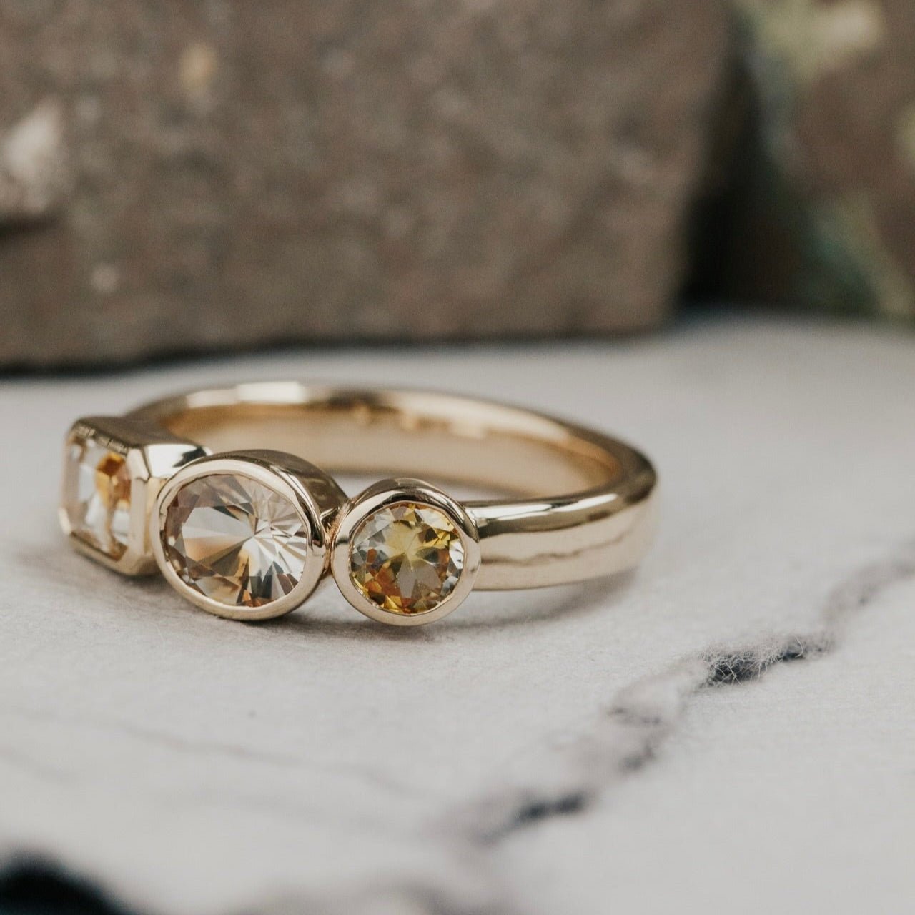 The Blaine Round, Oval, and Emerald Cut Montana Sapphire Ring