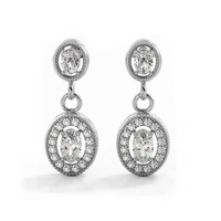1.0 ctw. Vintage Inspired Oval and Round Diamond Drop Earrings