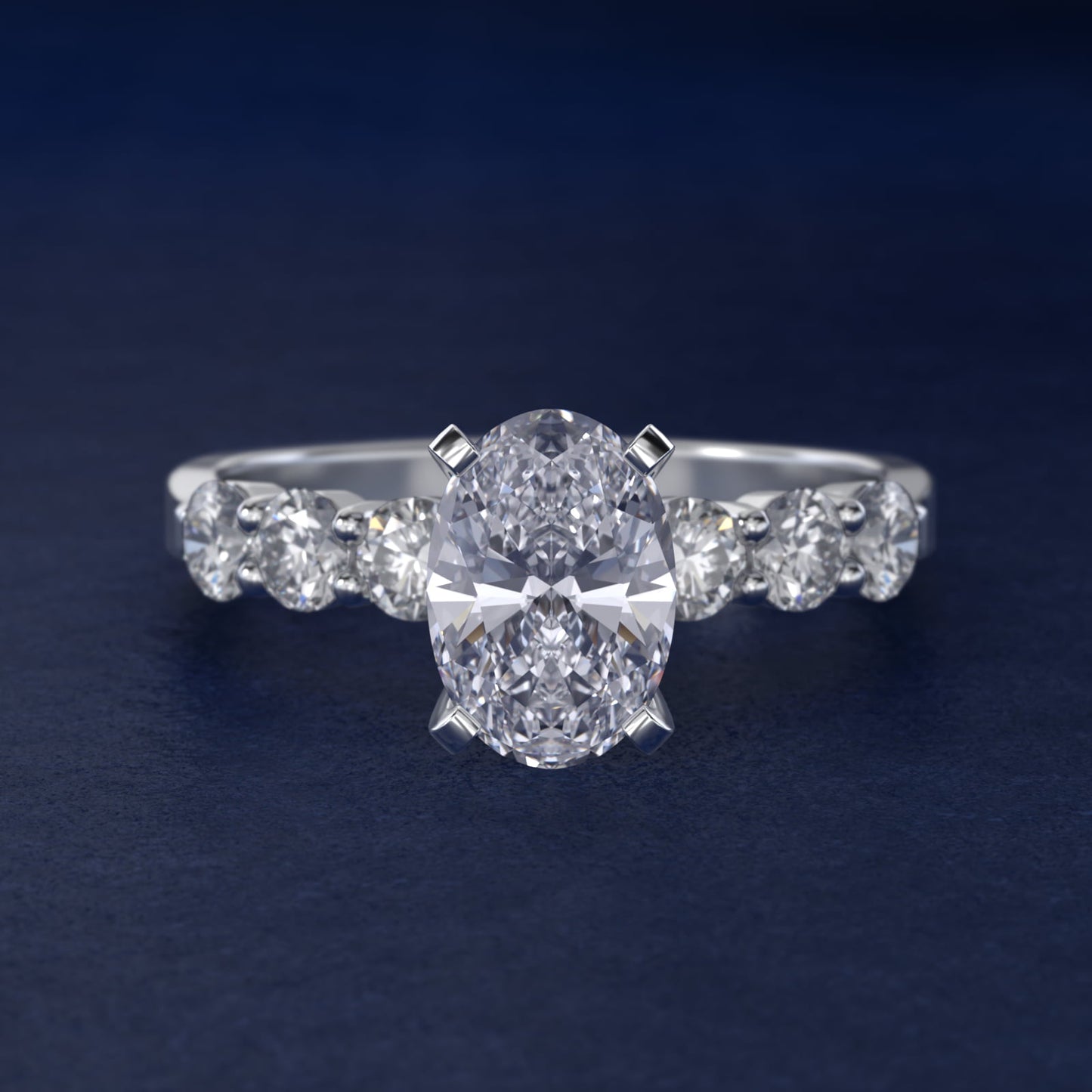 Six Round Side Stone Diamond Common Prong Engagement Ring In 14K White Gold By James Allen - Oval Center