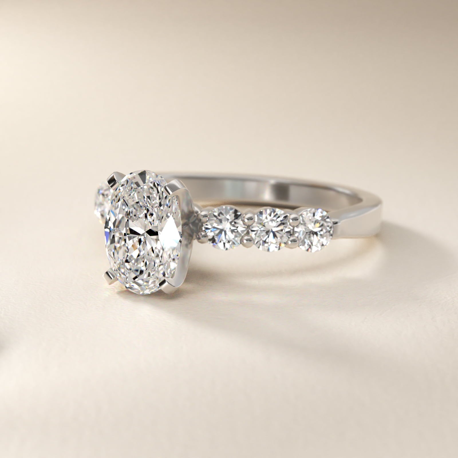 Six Round Side Stone Diamond Common Prong Engagement Ring In Platinum By James Allen - Oval Center