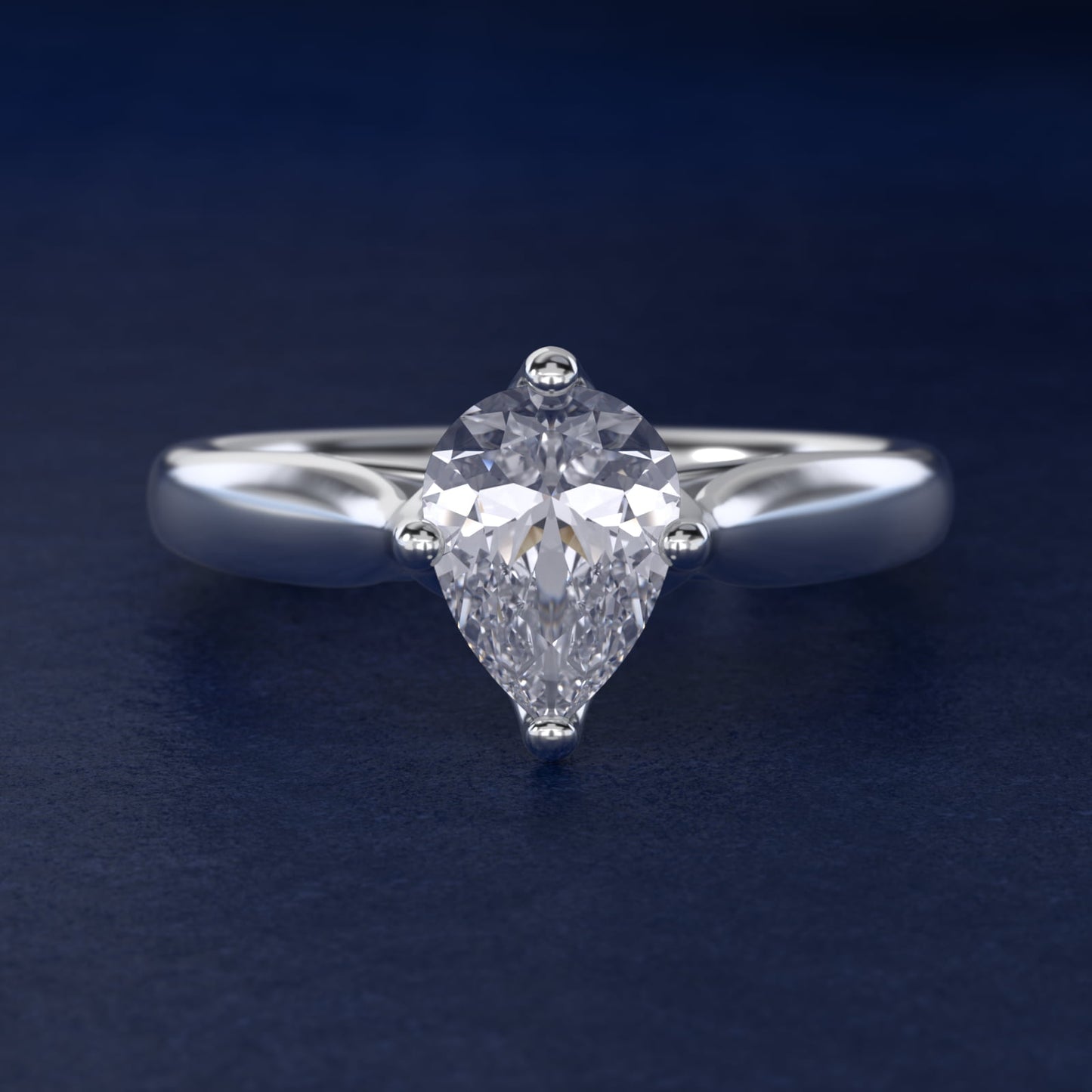 Solitaire Compass Set Engagement Ring in Platinum - Pear Center