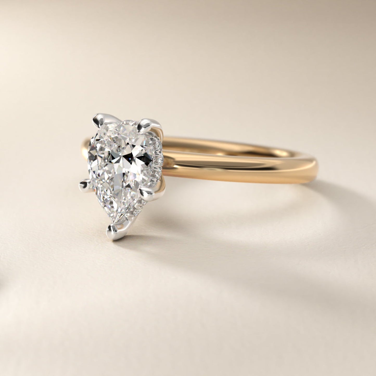 Solitaire Plus Hidden Halo Diamond Engagement Ring in 18k Yellow Gold - Pear Center