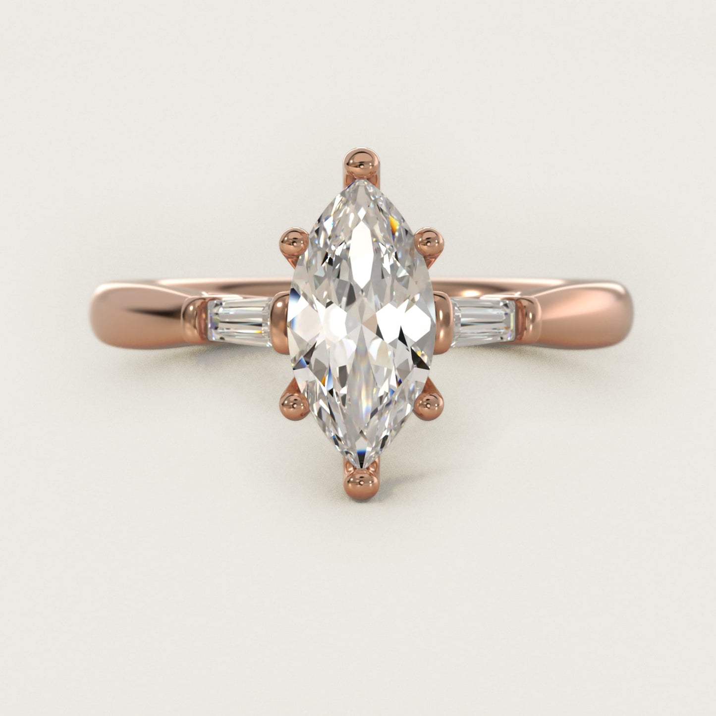 Tapered Baguette Diamond Engagement Ring in 14k Rose Gold (1/6 ct. tw.) - Marquise Center