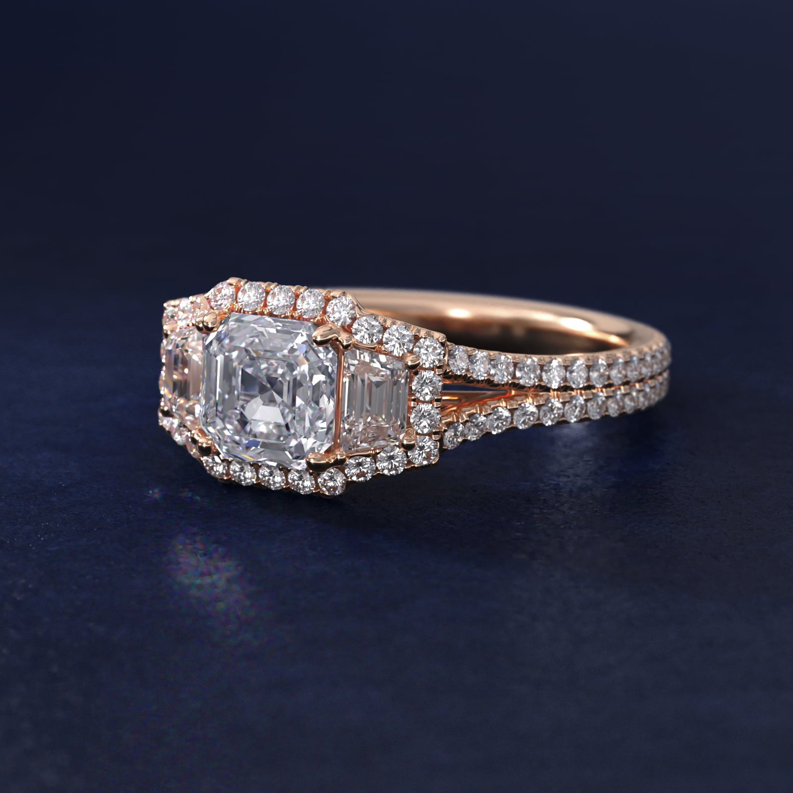 The Gallery Collection™ Emerald Three Stone Halo Diamond Engagement Ring in 18k Rose Gold (1.50 ct. tw.) - Asscher Center